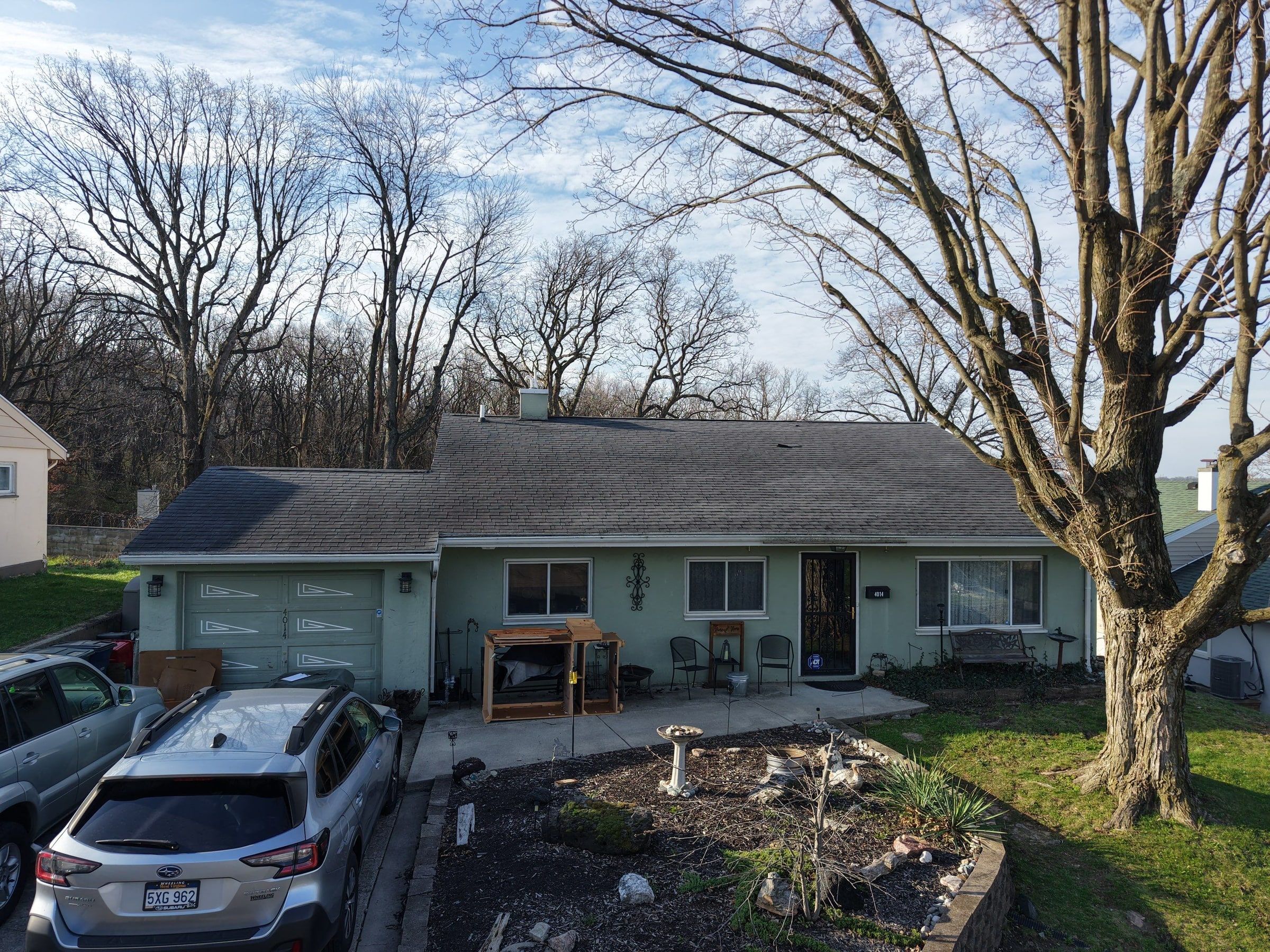 House front and drive from above
