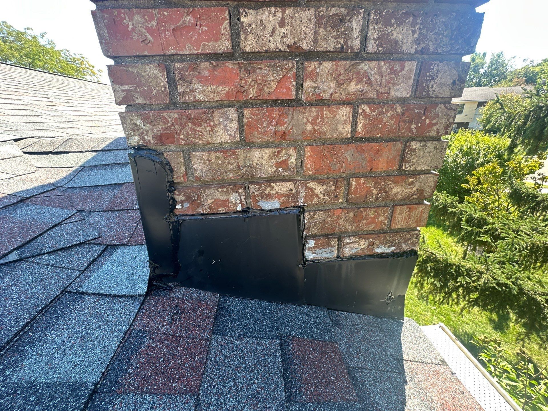 New step and counter flashing on the side of the chimney, West Carrollton, Ohio.