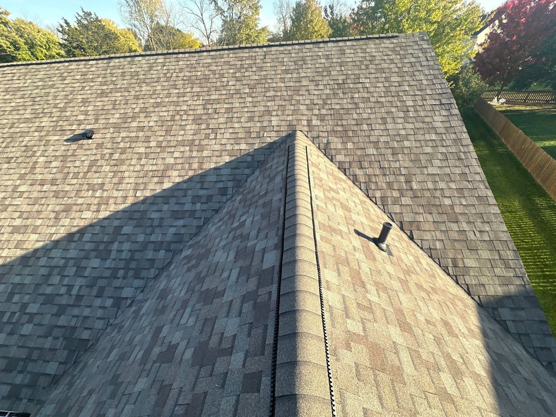 A finished hip and the main slope with a new roof vent, Beavercreek, Ohio.