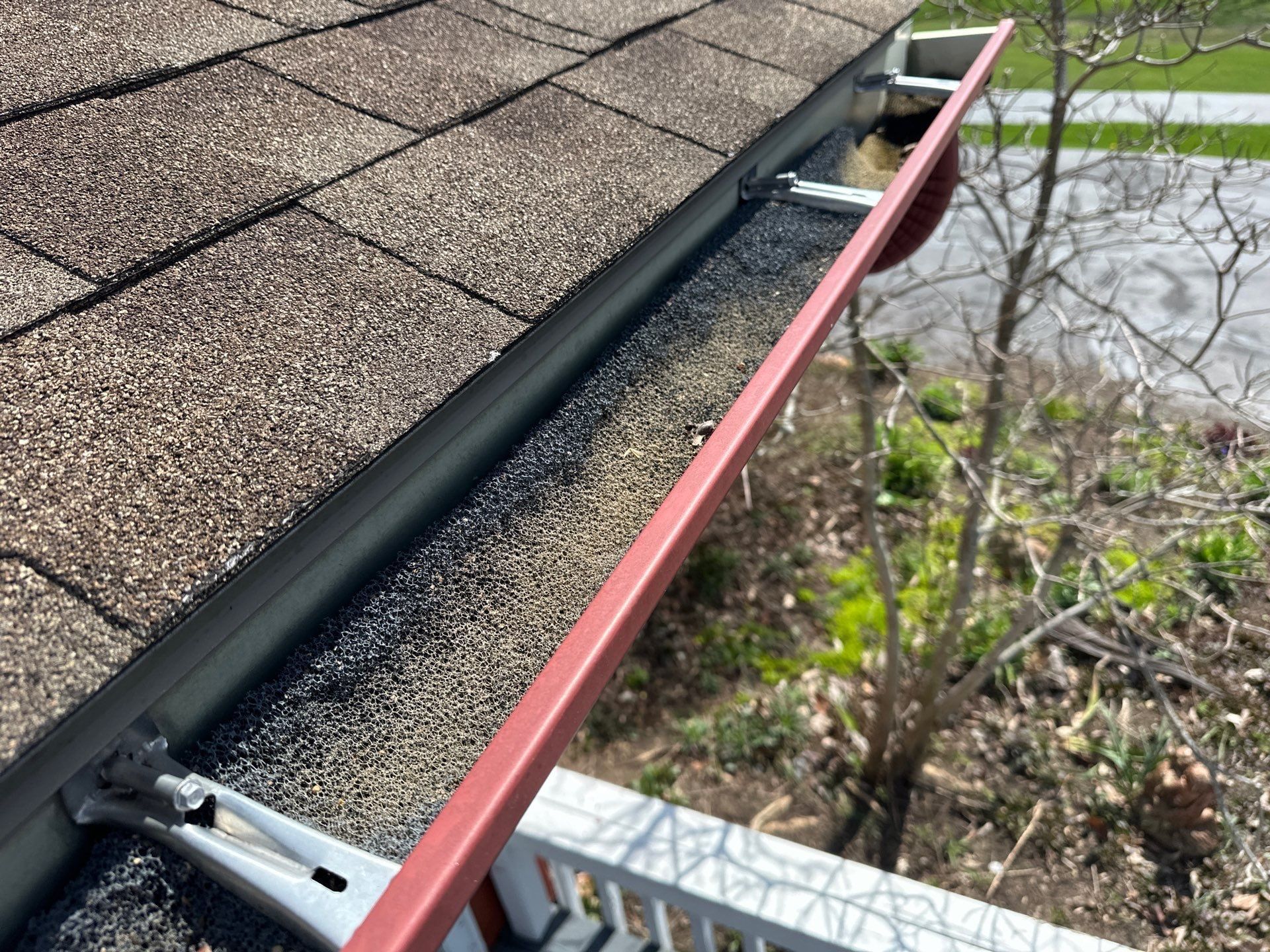 Gutter with granules from the roof