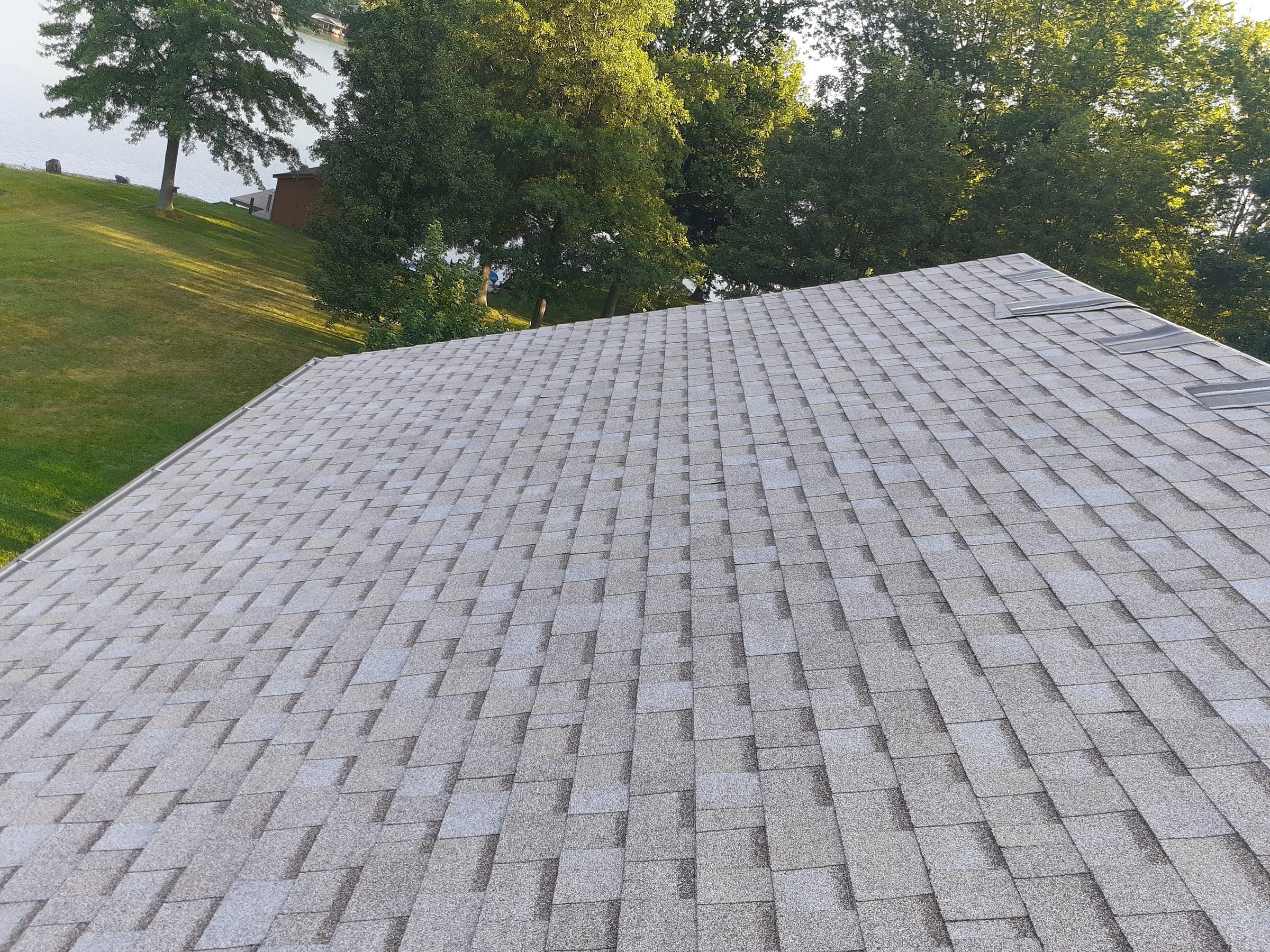 Even rows of new shingles across the back slope, Jamestown, Ohio.