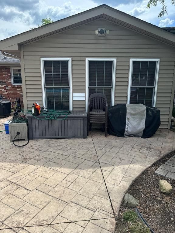 The siding on the sunroom wall behind the patio, Beavercreek, Ohio.