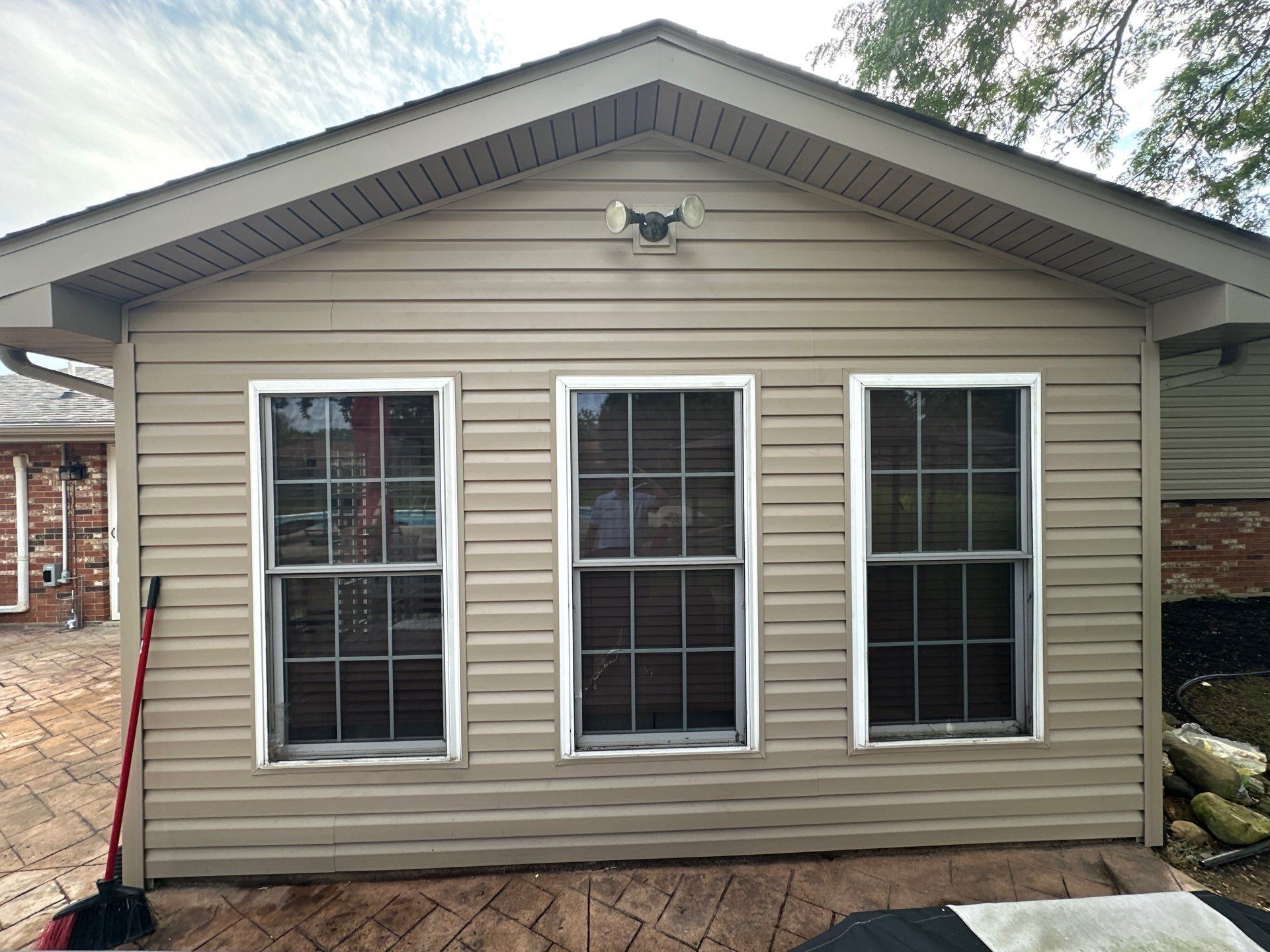 The finished sunroom wall with its three windows, Beavercreek, Ohio.