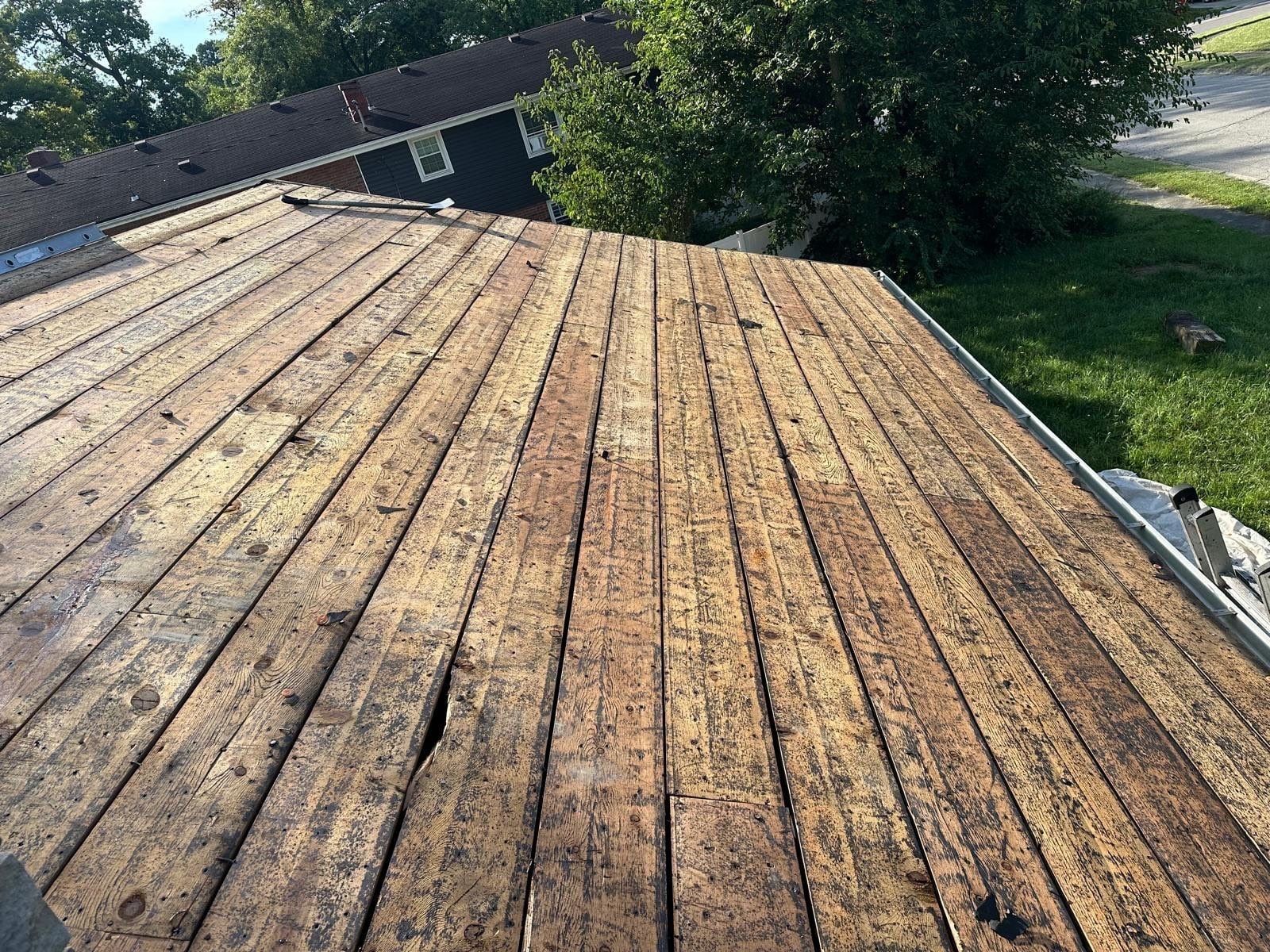 The board deck over the front of the house, with the street beyond, Fairborn, Ohio.