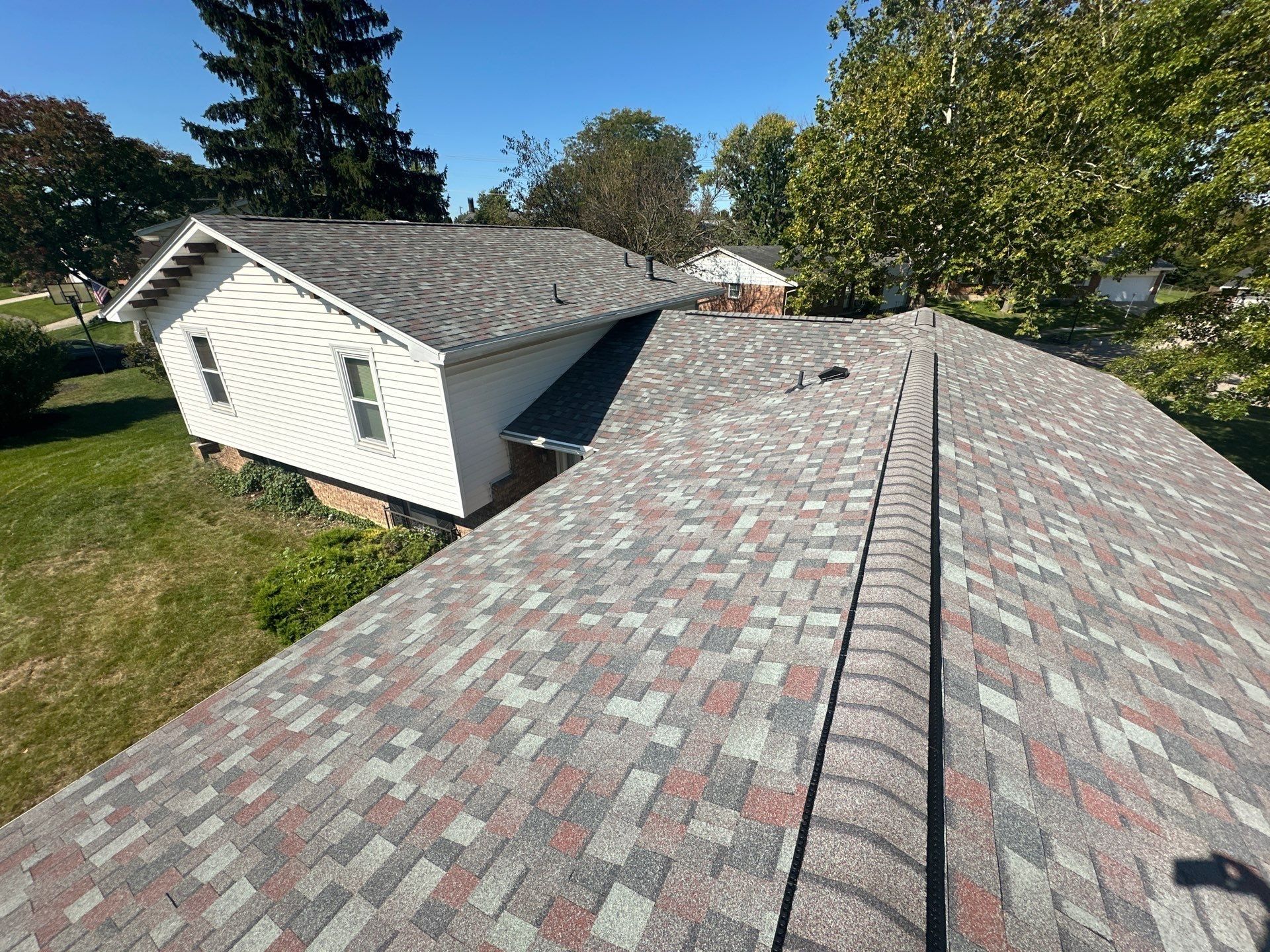 Ridge vent running toward the finished garage roof, West Carrollton, Ohio.