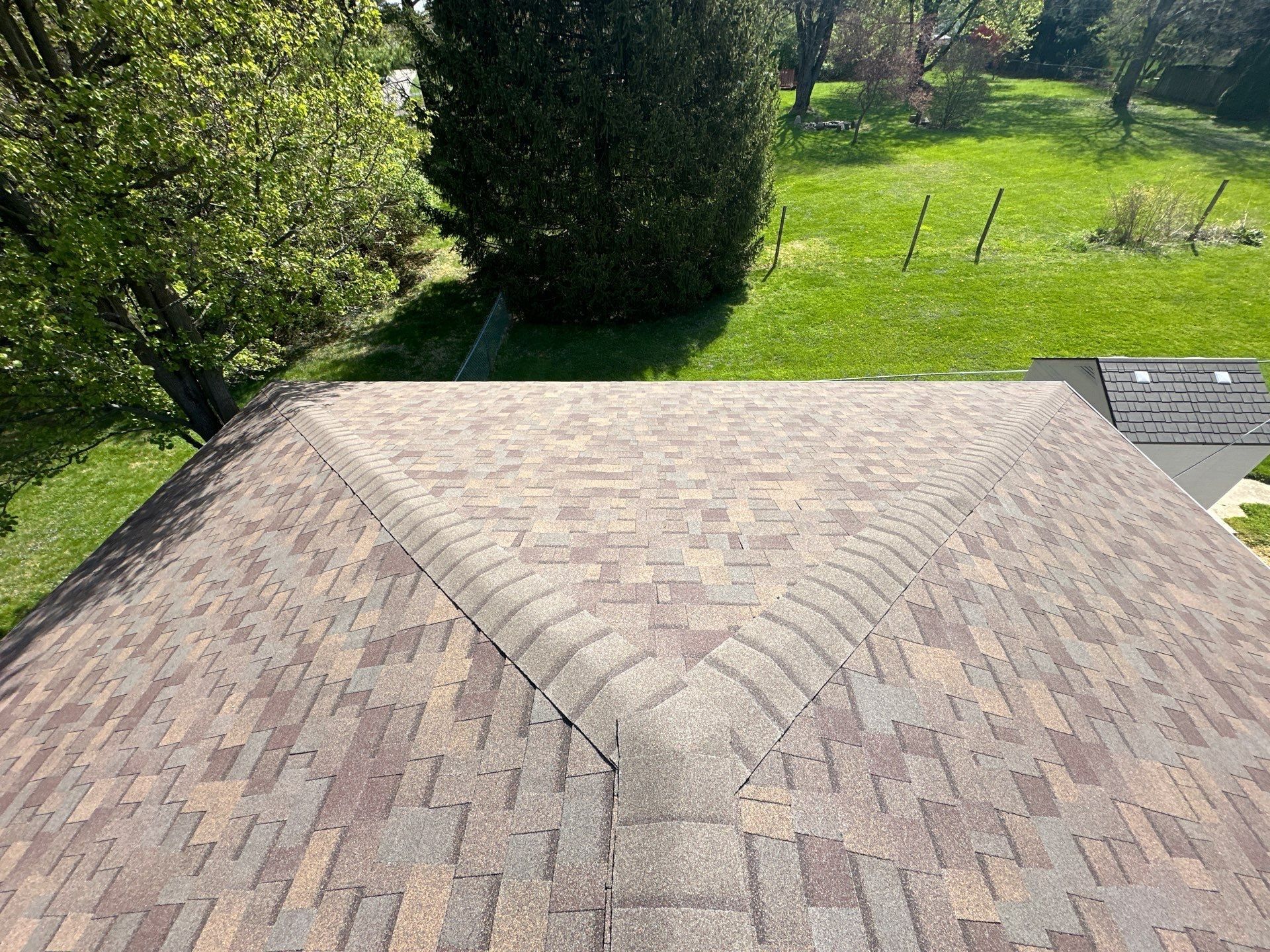 Shingles meeting the ridge