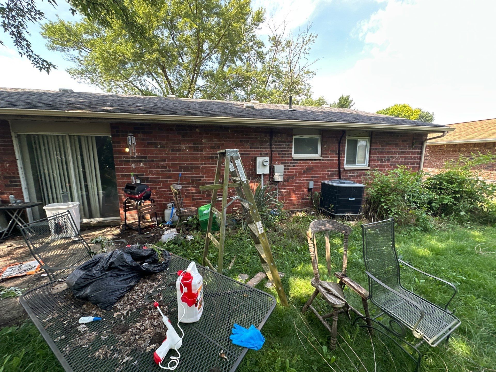 Patio, ladder and debris sacks