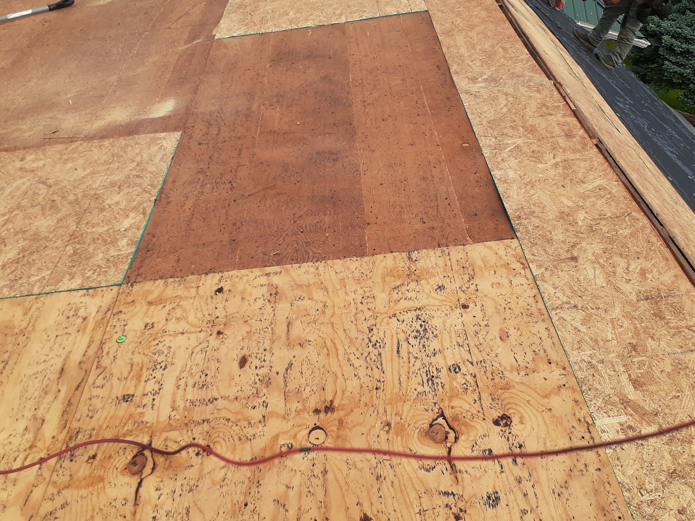 A long run of new OSB patched into the deck, Huber Heights, Ohio.