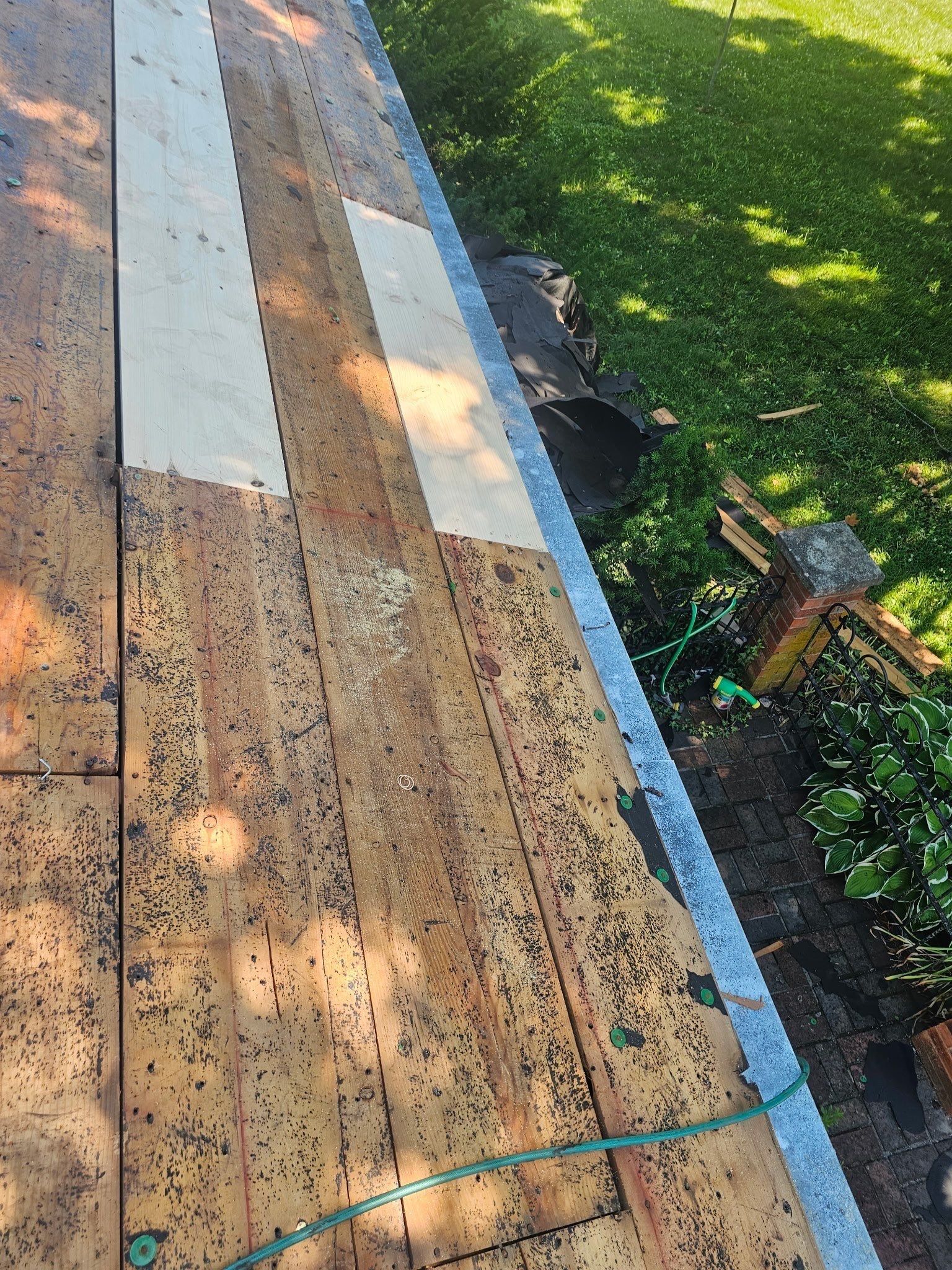 New metal along the eave edge