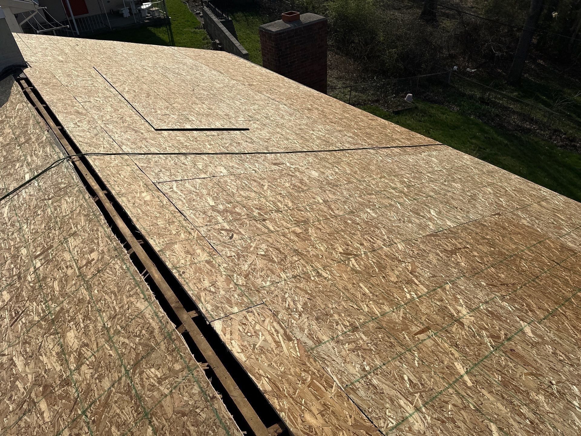 Sheathing and the ridge cut open