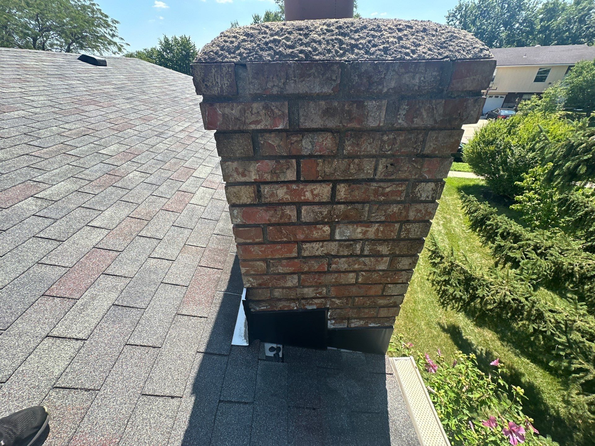 The brick chimney from below, with its old step flashing, West Carrollton, Ohio.