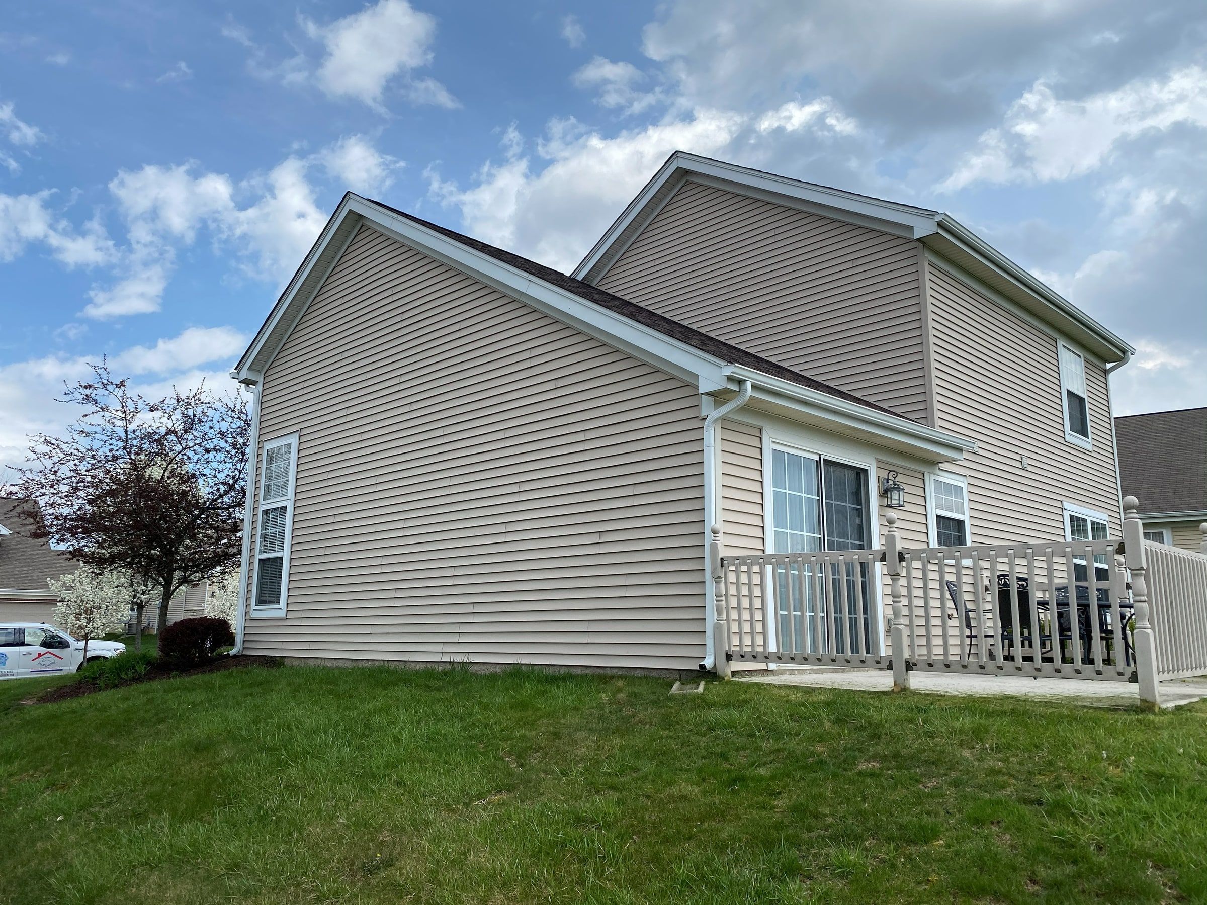 Tan gable end, rear corner and deck rail