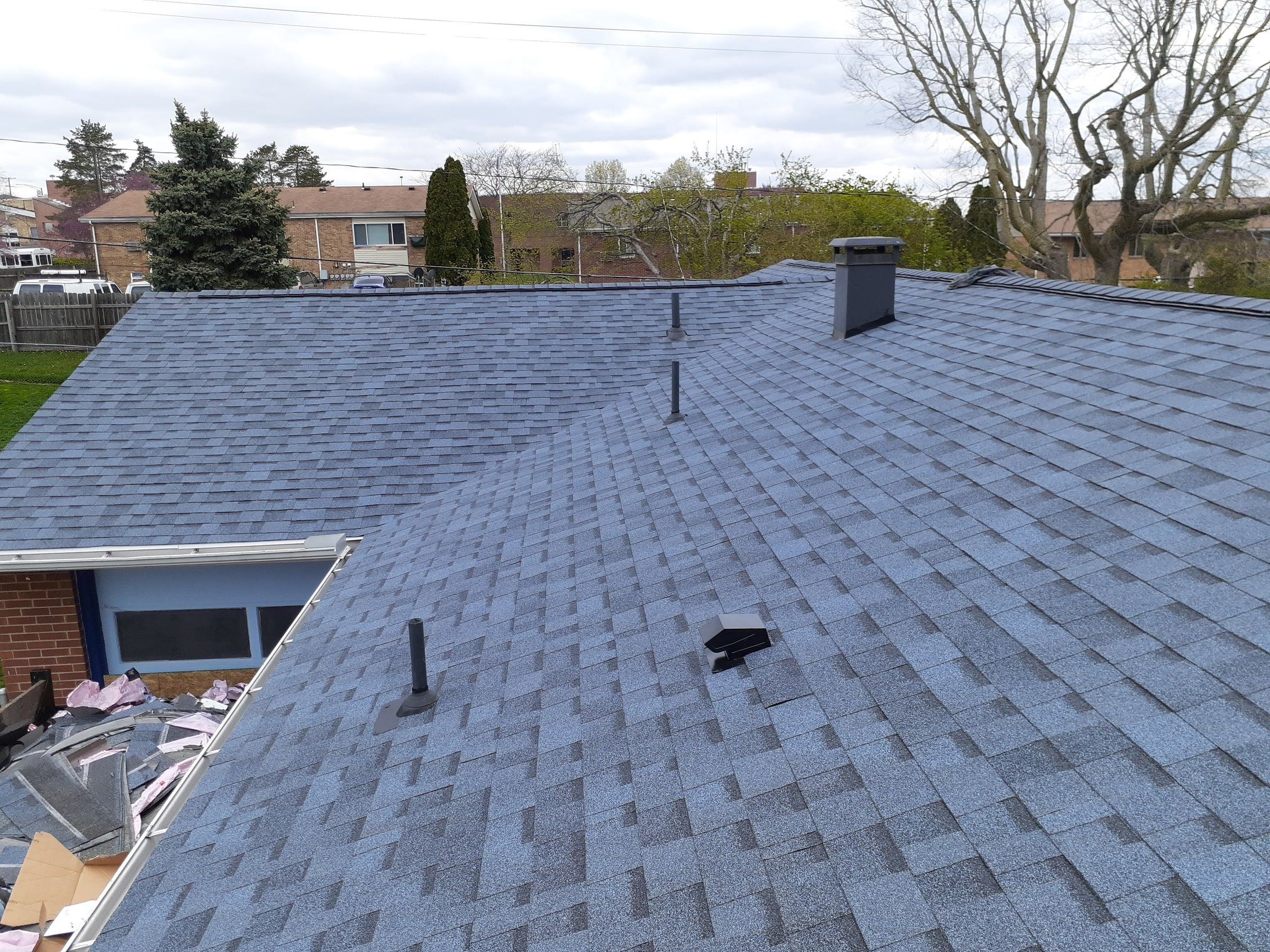 The finished front slopes with the chimney and pipe vents, Kettering, Ohio.
