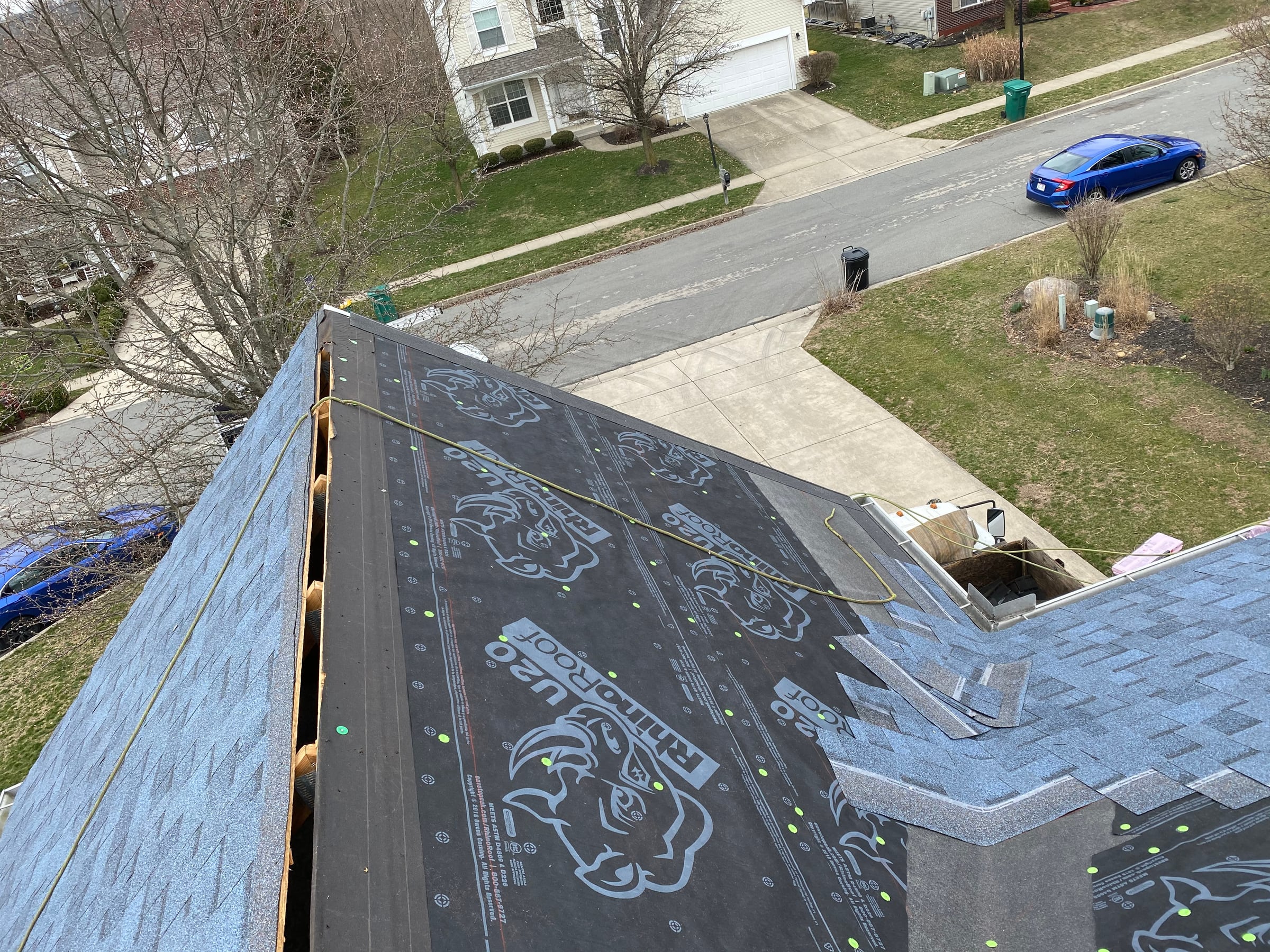 Last plane in underlayment beside shingled planes