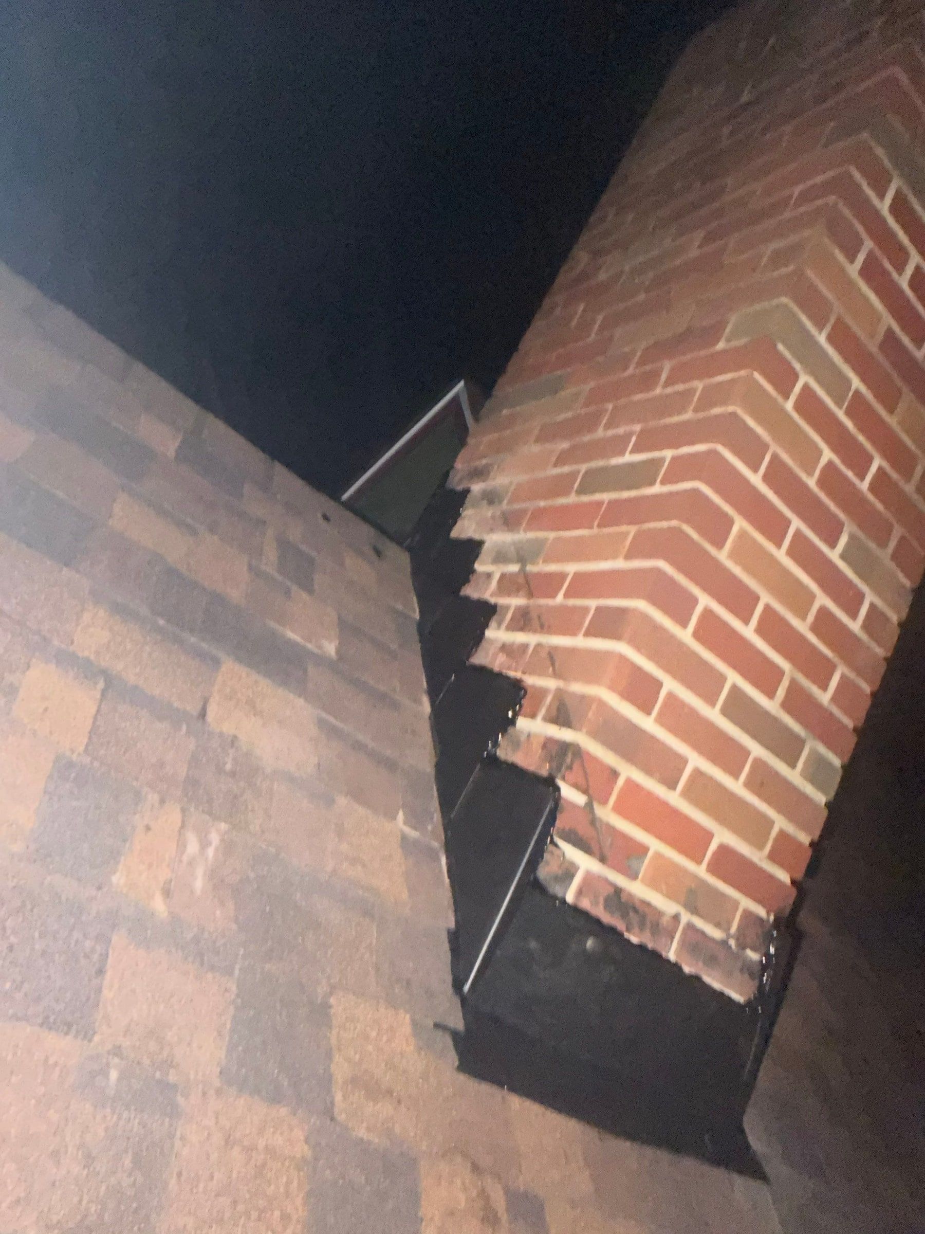 Chimney flashing stepped up the brickwork
