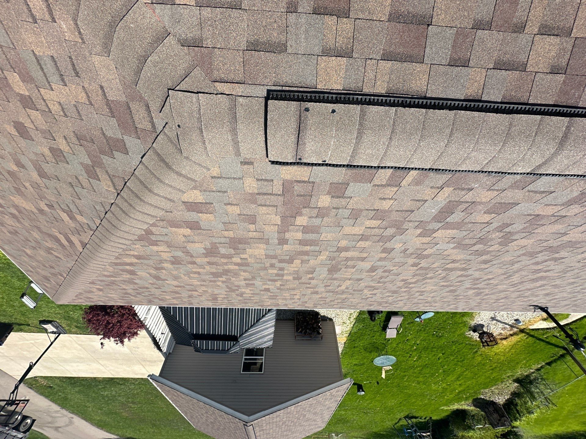 Ridge vent under the cap shingles