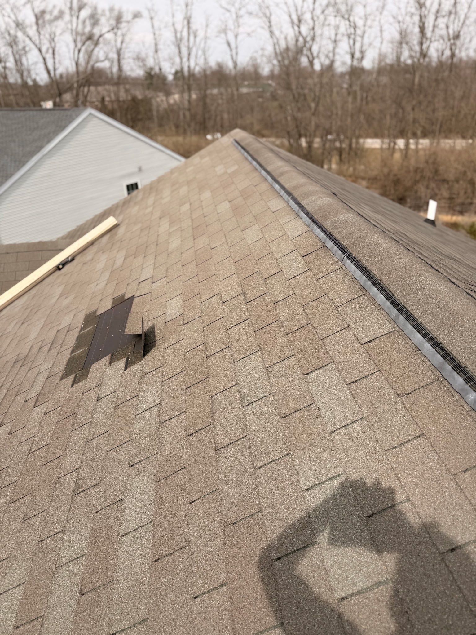 Gap in the shingle slope
