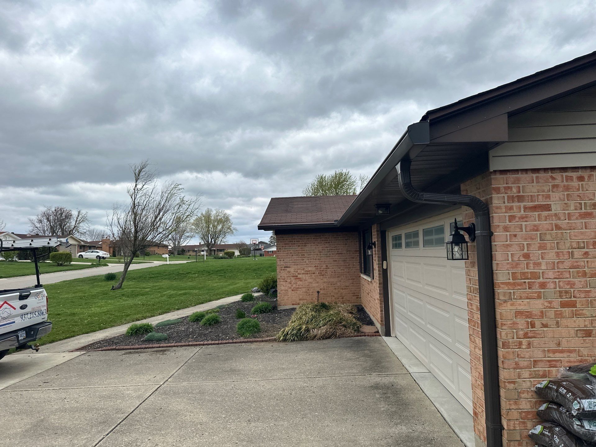 The garage end of the brick ranch at the April visit, Beavercreek, Ohio.