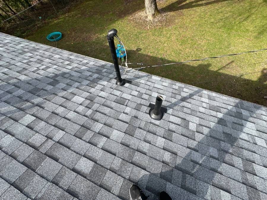 New pipe boots on the finished gray shingles, Beavercreek, Ohio.