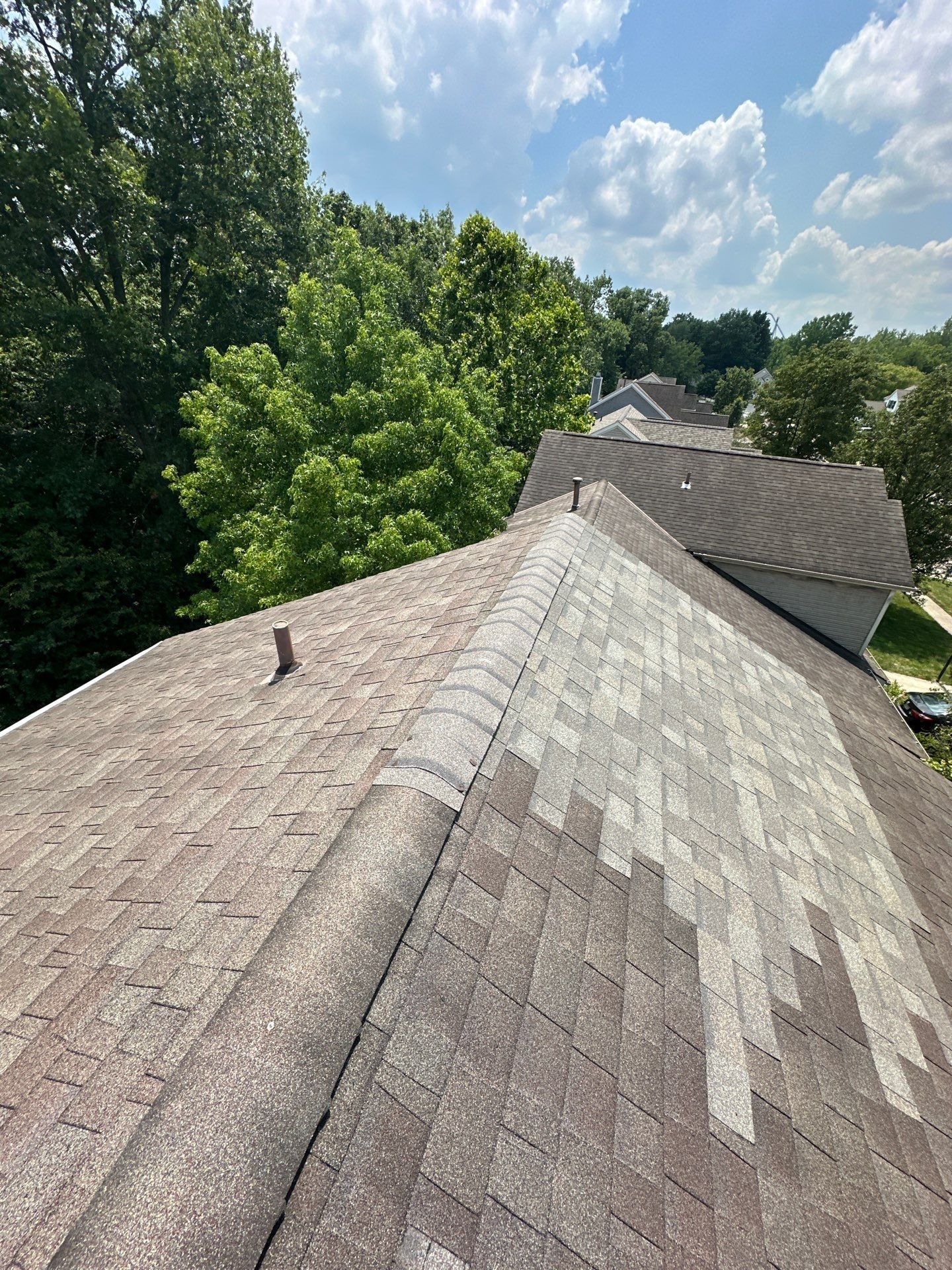 Shingles to the capped hip and pipe vent