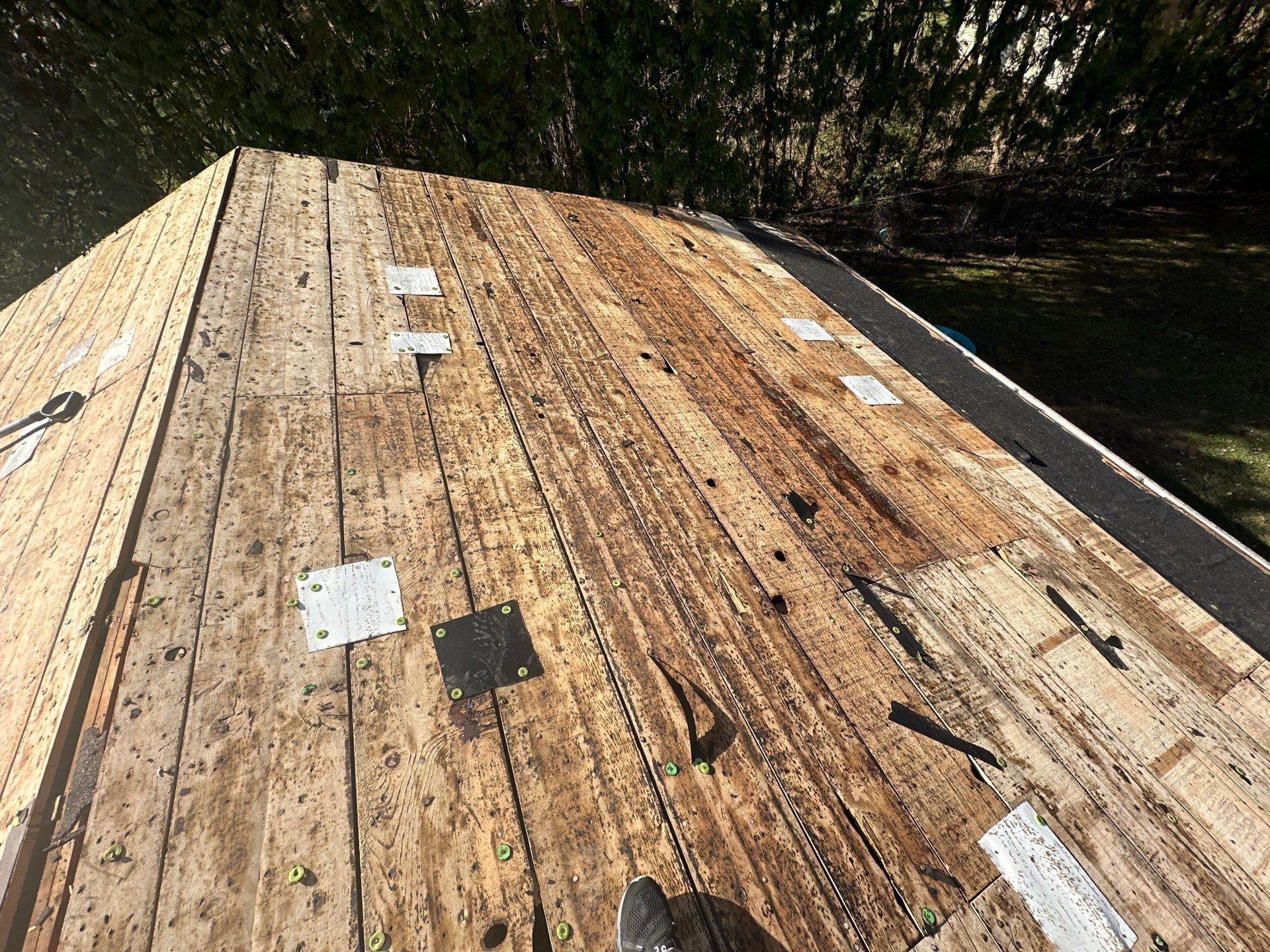 Board decking, old patches and cap fasteners