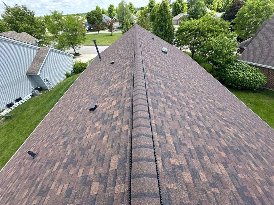 Finished wind damage roof replacement seen from the ridge, Beavercreek, Ohio.