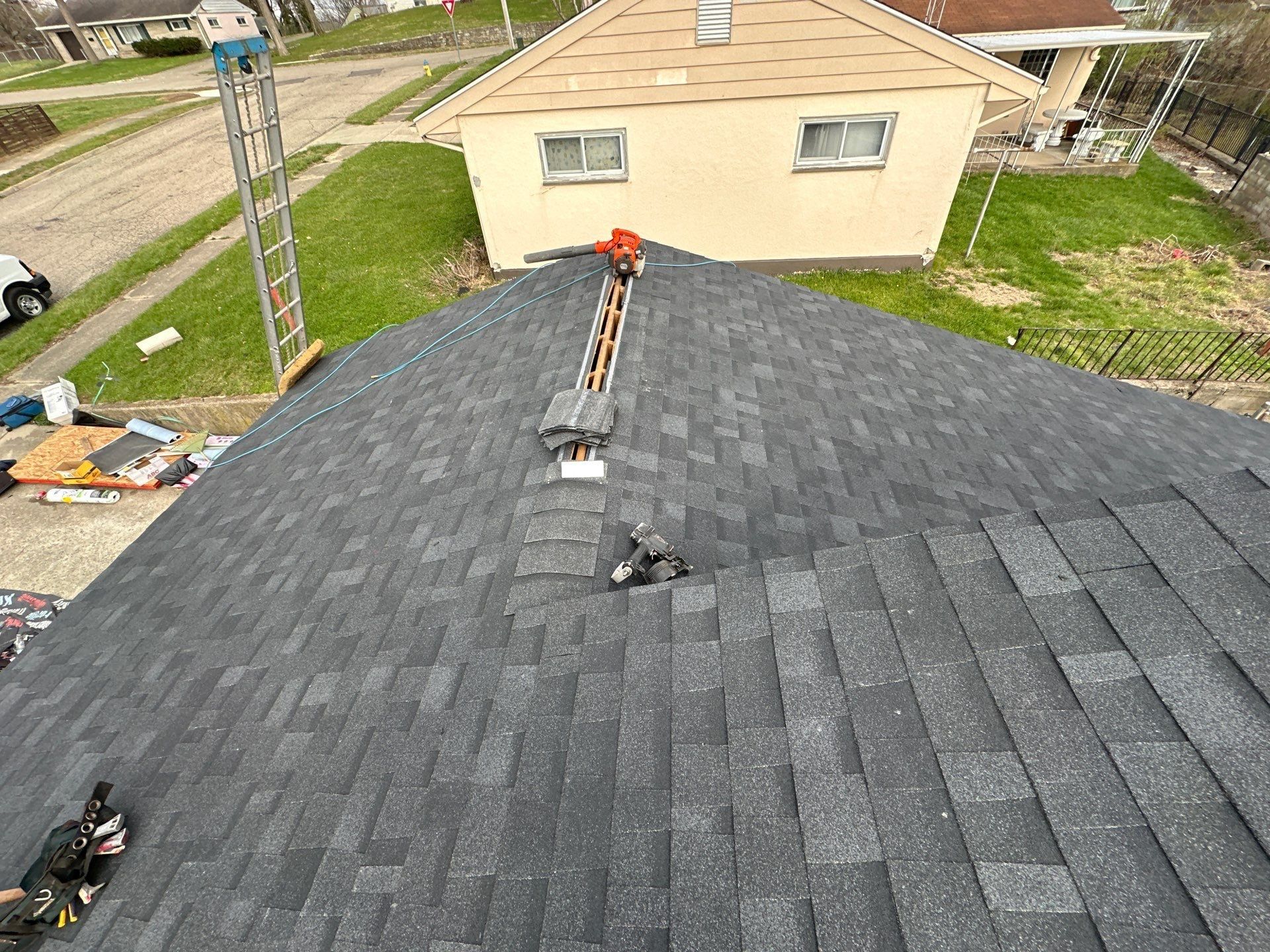 The open ridge ready for its vent, above the side yard, Dayton, Ohio.