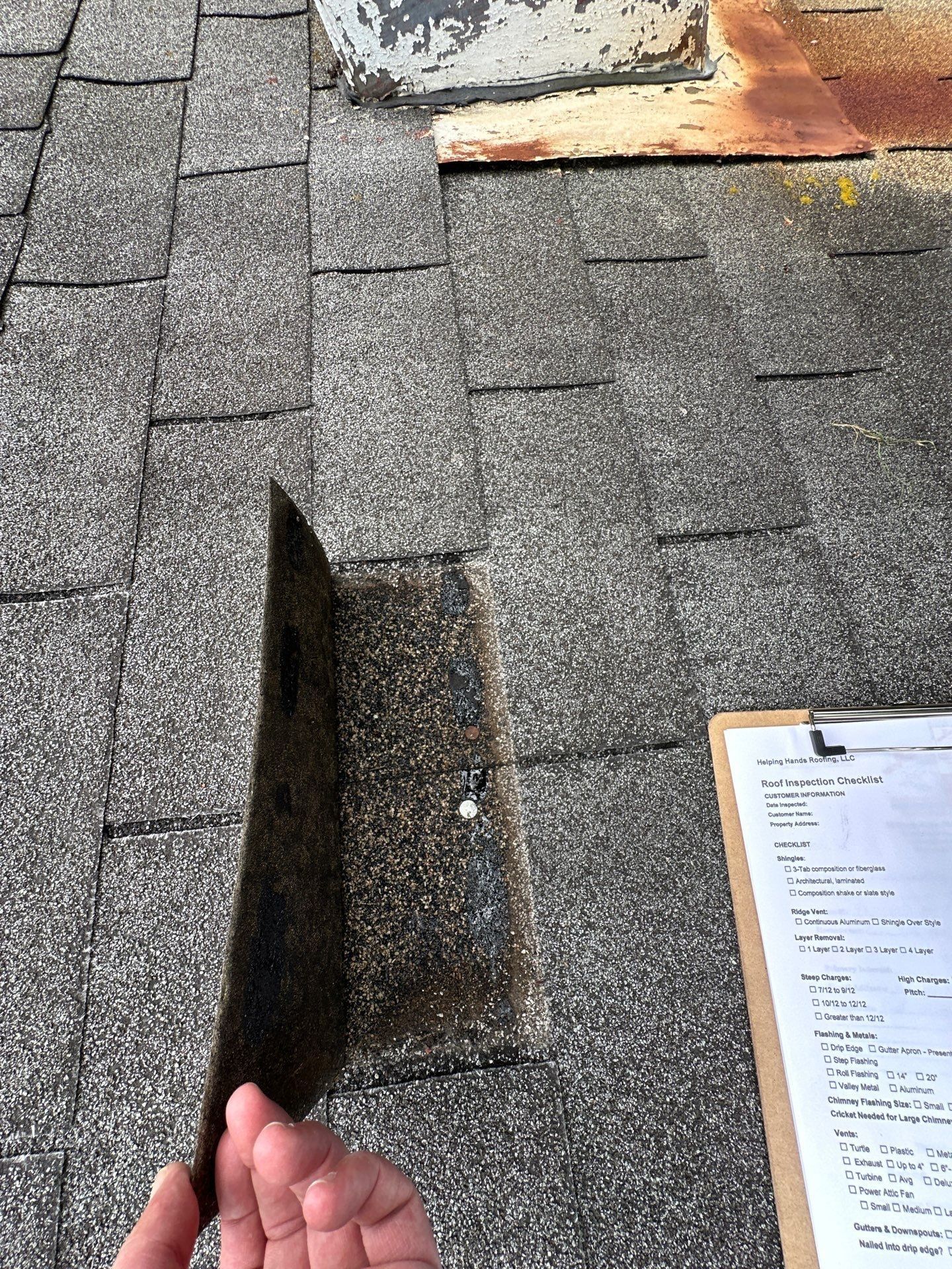 Lifted shingle and the inspection checklist