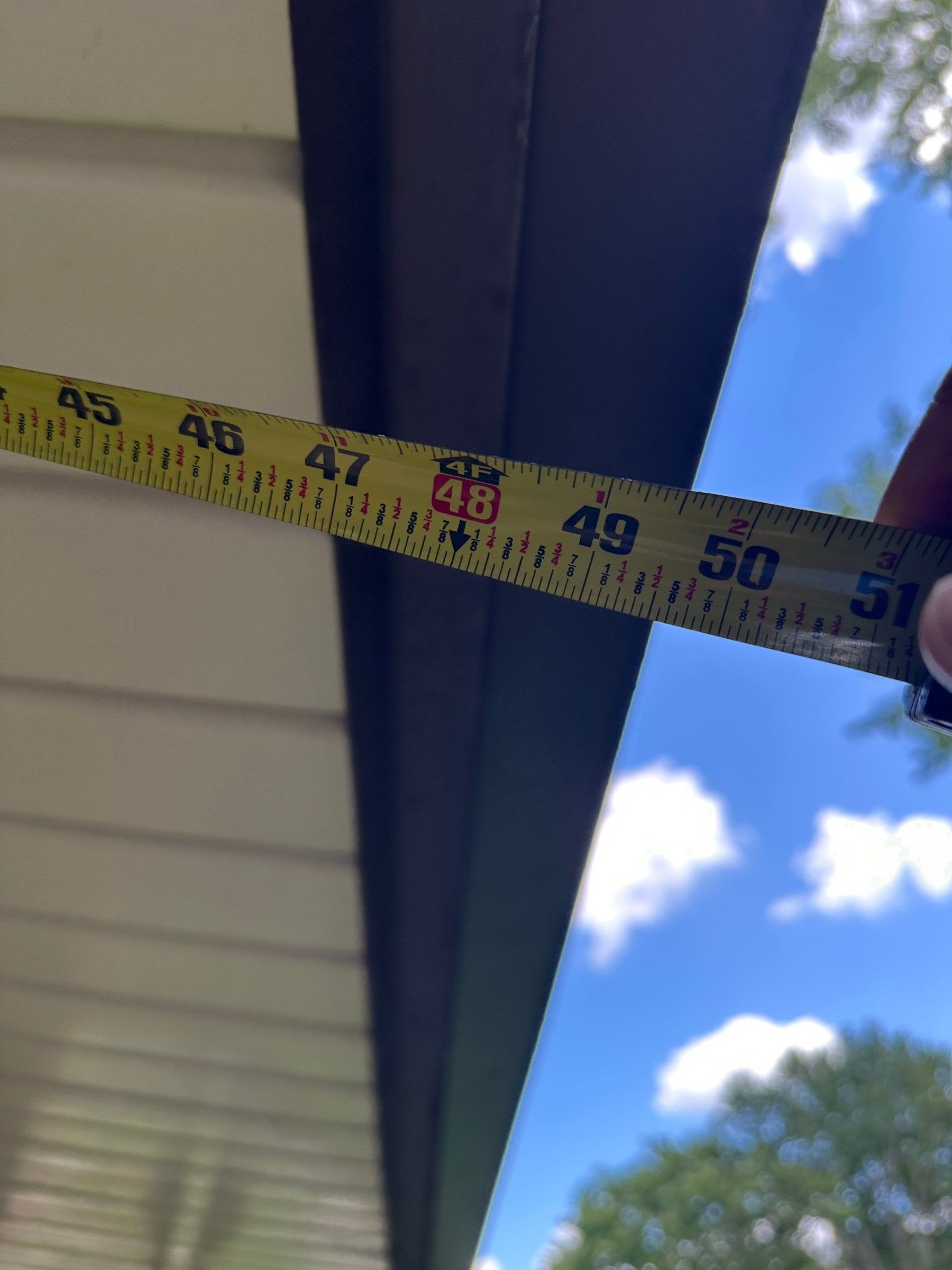 A tape measure across the deep soffit, Kettering, Ohio.