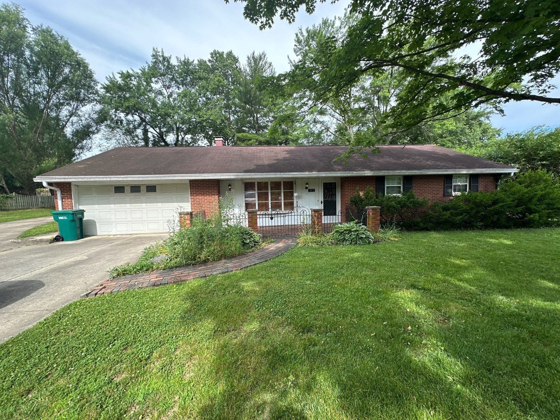 Brick ranch and white garage door