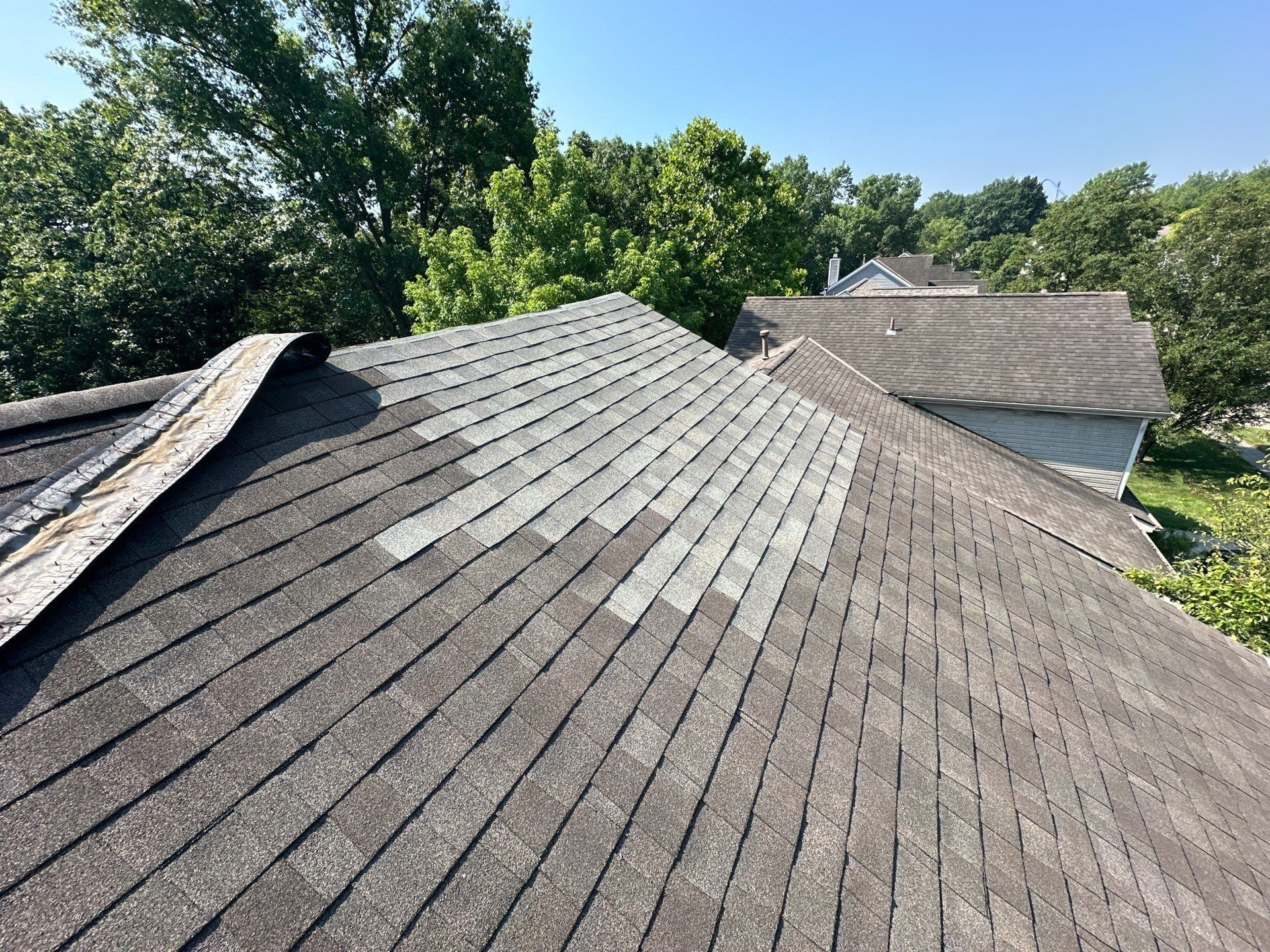 The lighter repaired patch standing out from the rest of the roof, Kings Mills, Ohio.