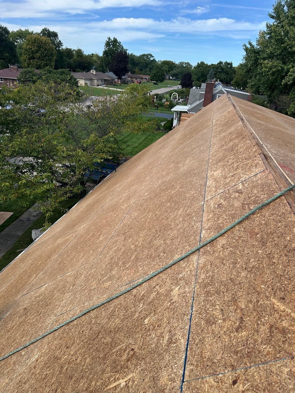 New sheathing running the length of the roof, Beavercreek, Ohio.