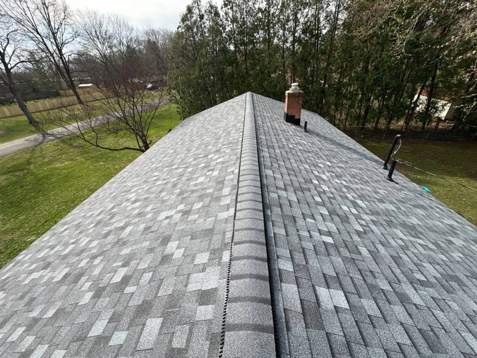The finished ridge vent and gray Duration shingles, Beavercreek, Ohio.
