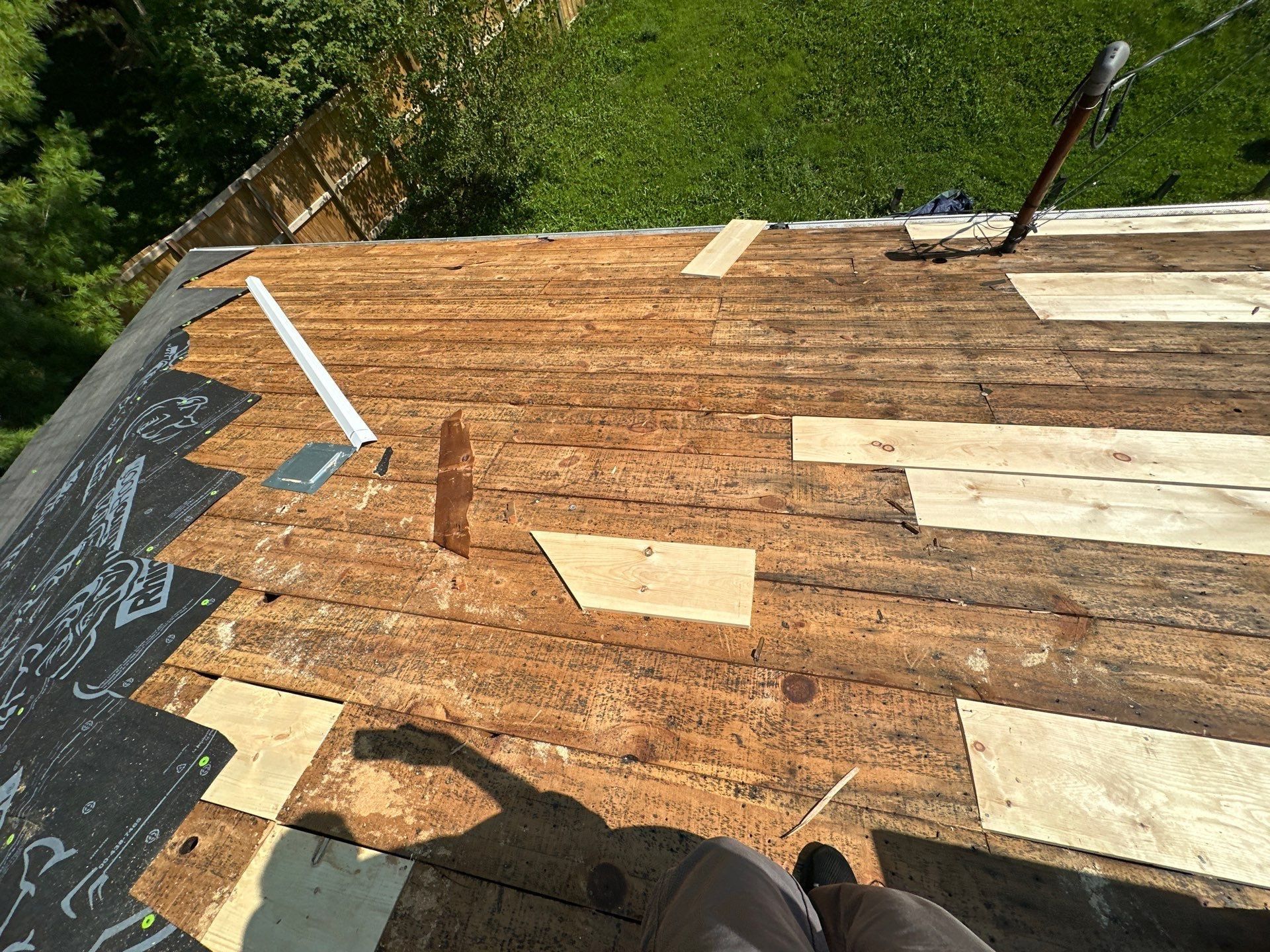 New boards set in where rotted boards came out, beside the old deck, Fairborn, Ohio.