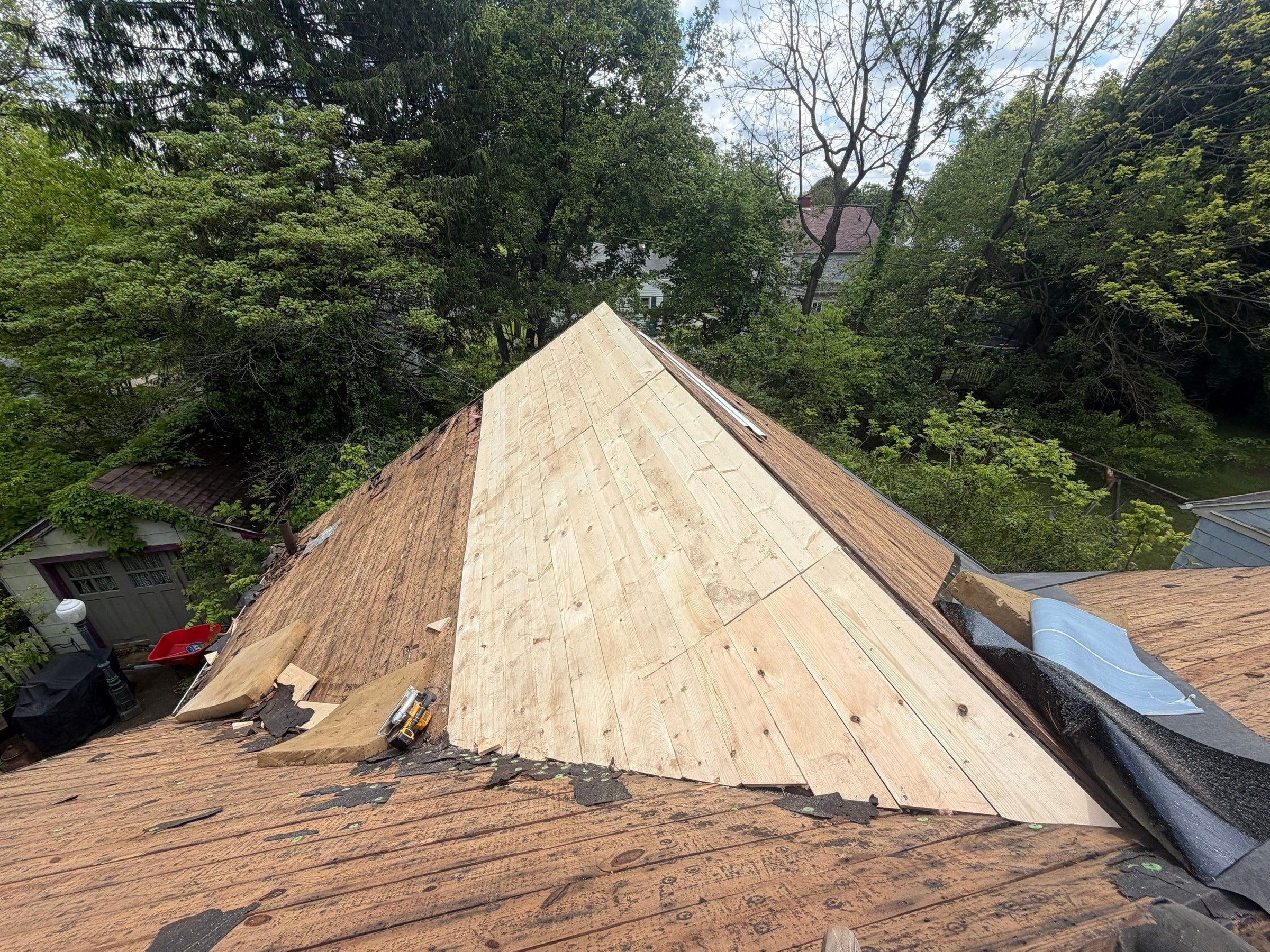 Gable plane re-decked beside original plank