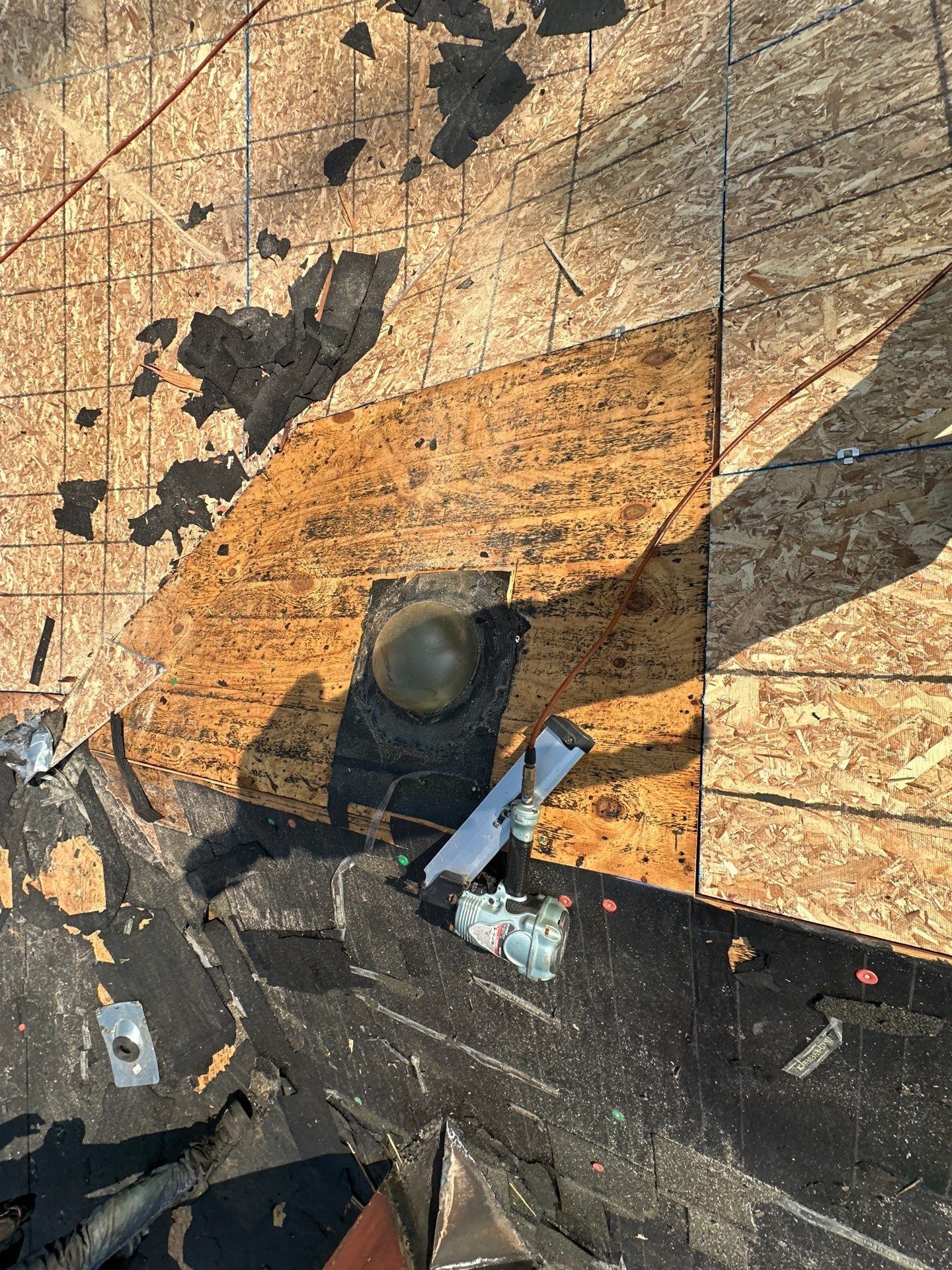 New sheathing beside old plank decking