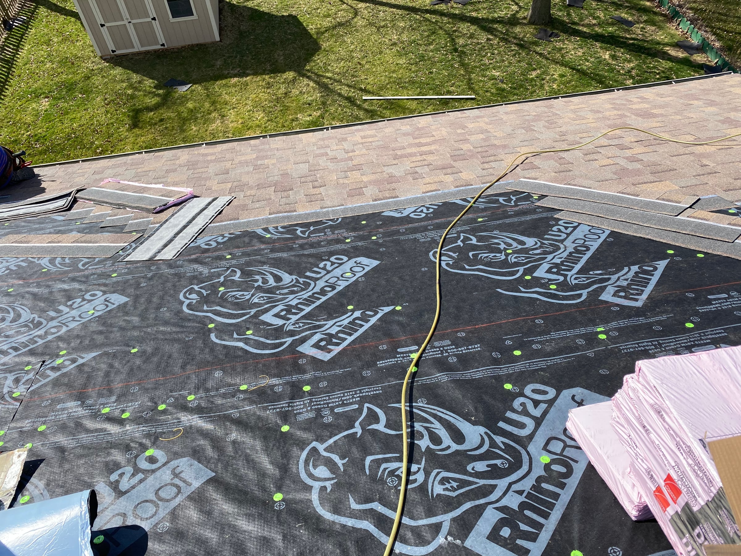 Shingles meeting the underlayment edge