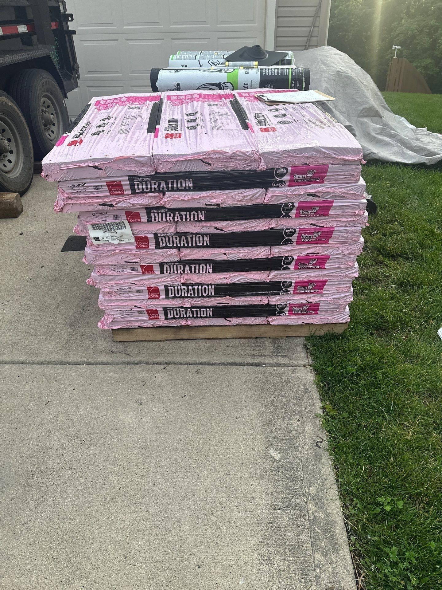 Bundles of Owens Corning Duration shingles stacked on the driveway, Beavercreek, Ohio.