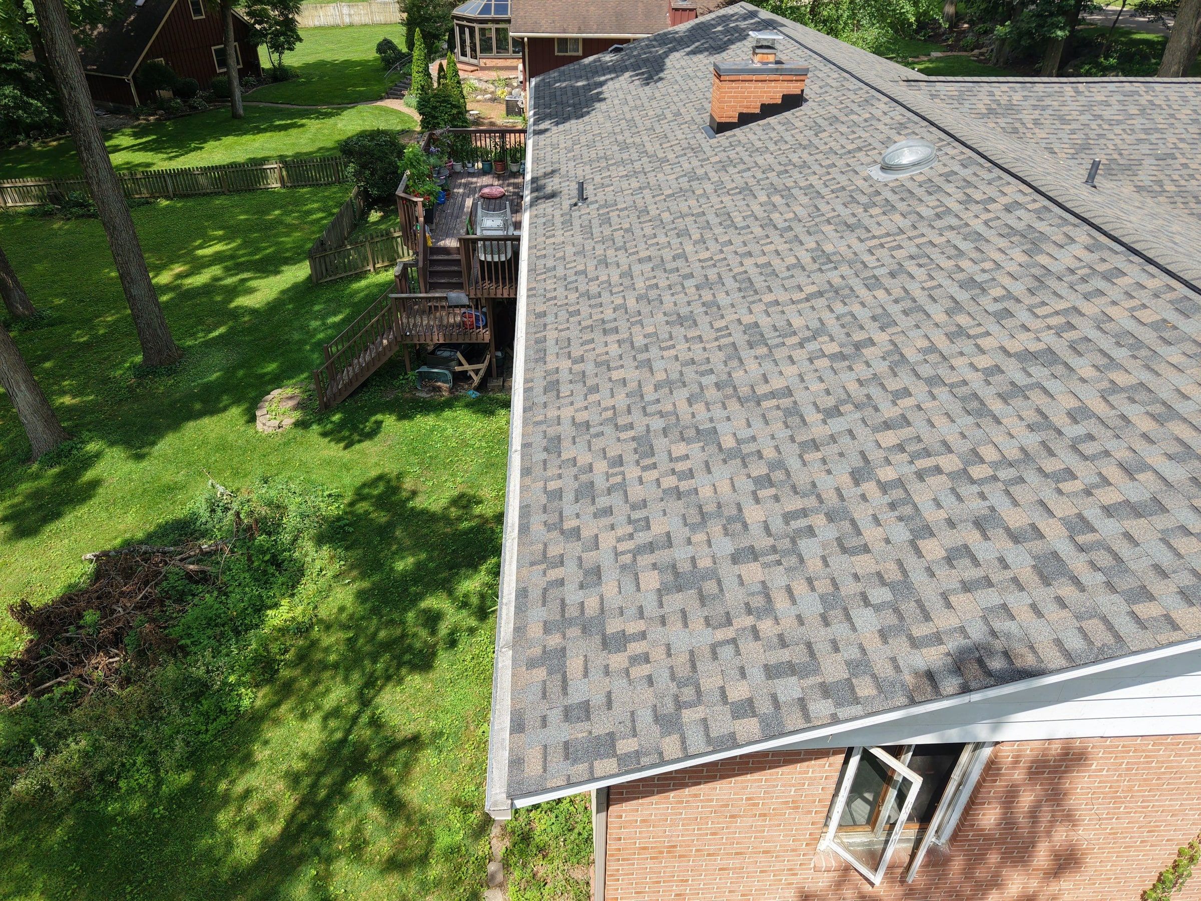 Gutter guards along the eave of the finished roof, seen from the drone, Beavercreek, Ohio.