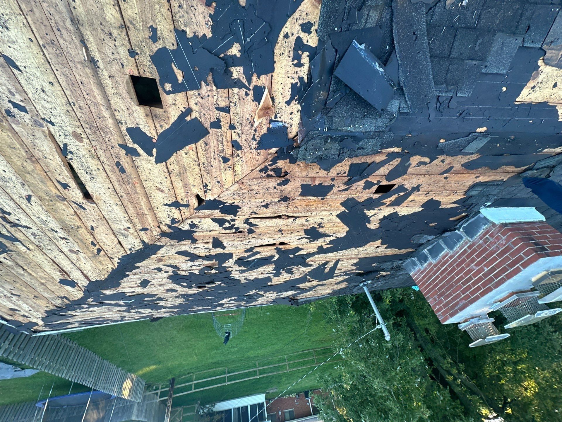 The plank deck and chimney during the tear-off, Kettering, Ohio.