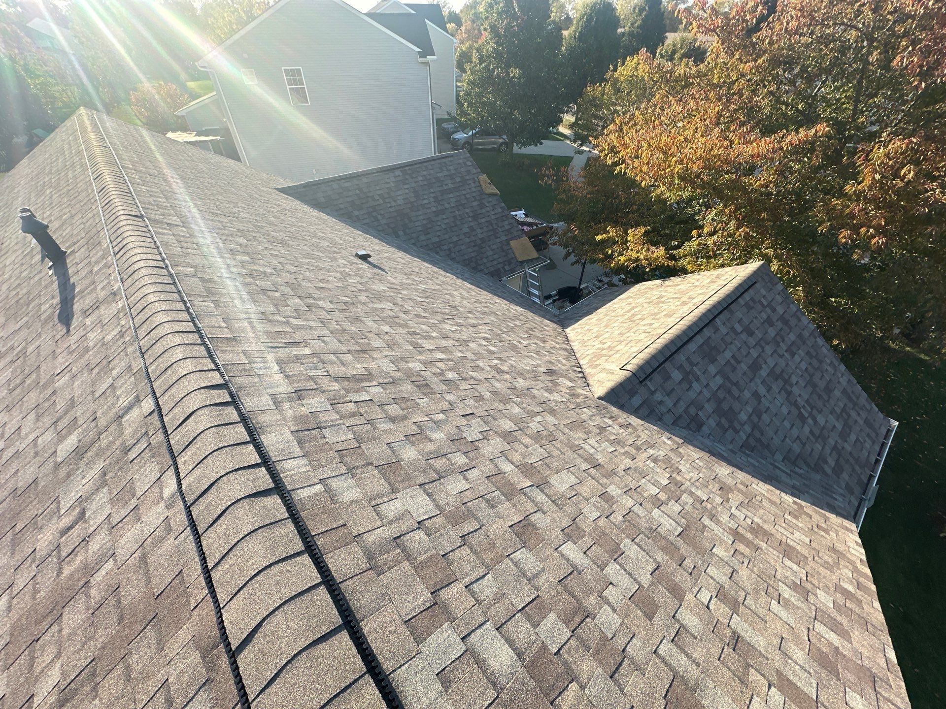 The ridge cap over a back section, the patio below, Beavercreek, Ohio.