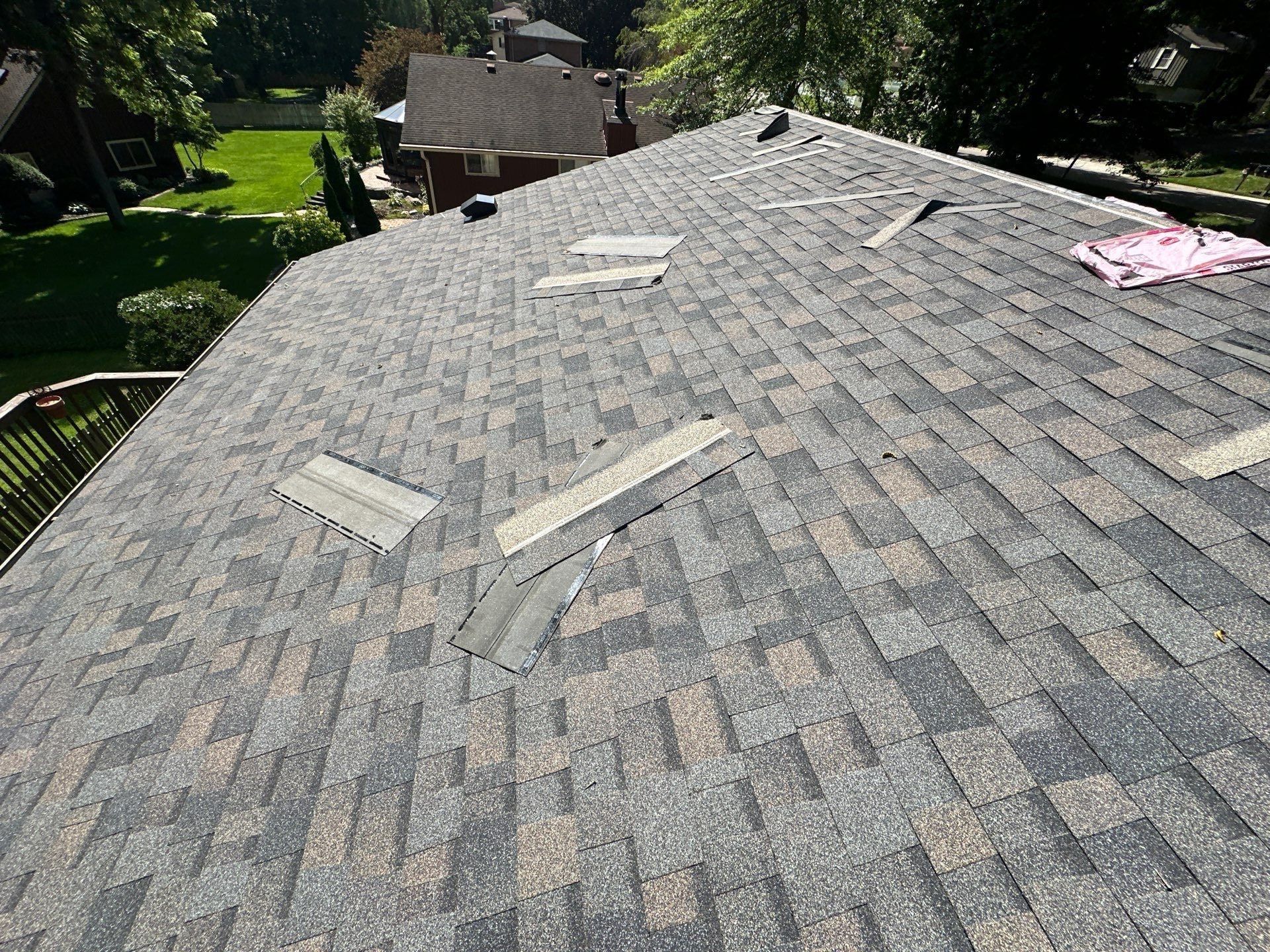 New Owens Corning shingles covering the back plane of the roof, Beavercreek, Ohio.