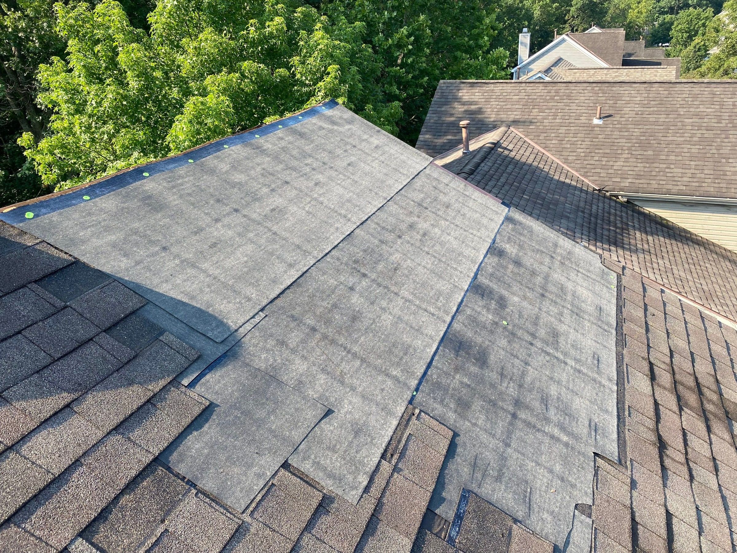 Gray underlayment and green cap fasteners