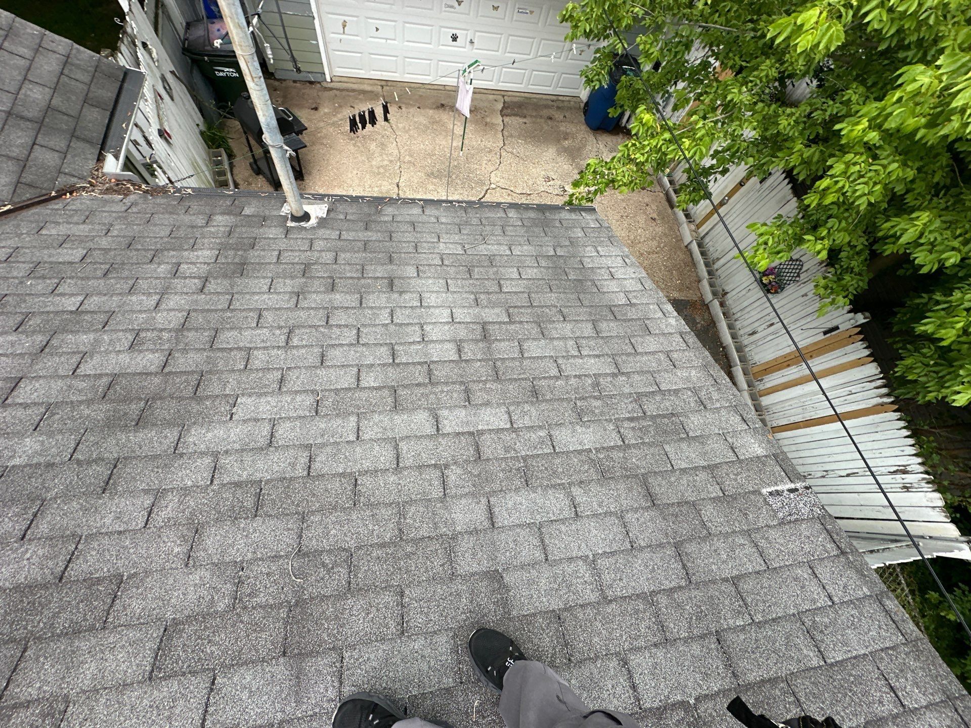 Three-tab roof, concrete apron and clothesline