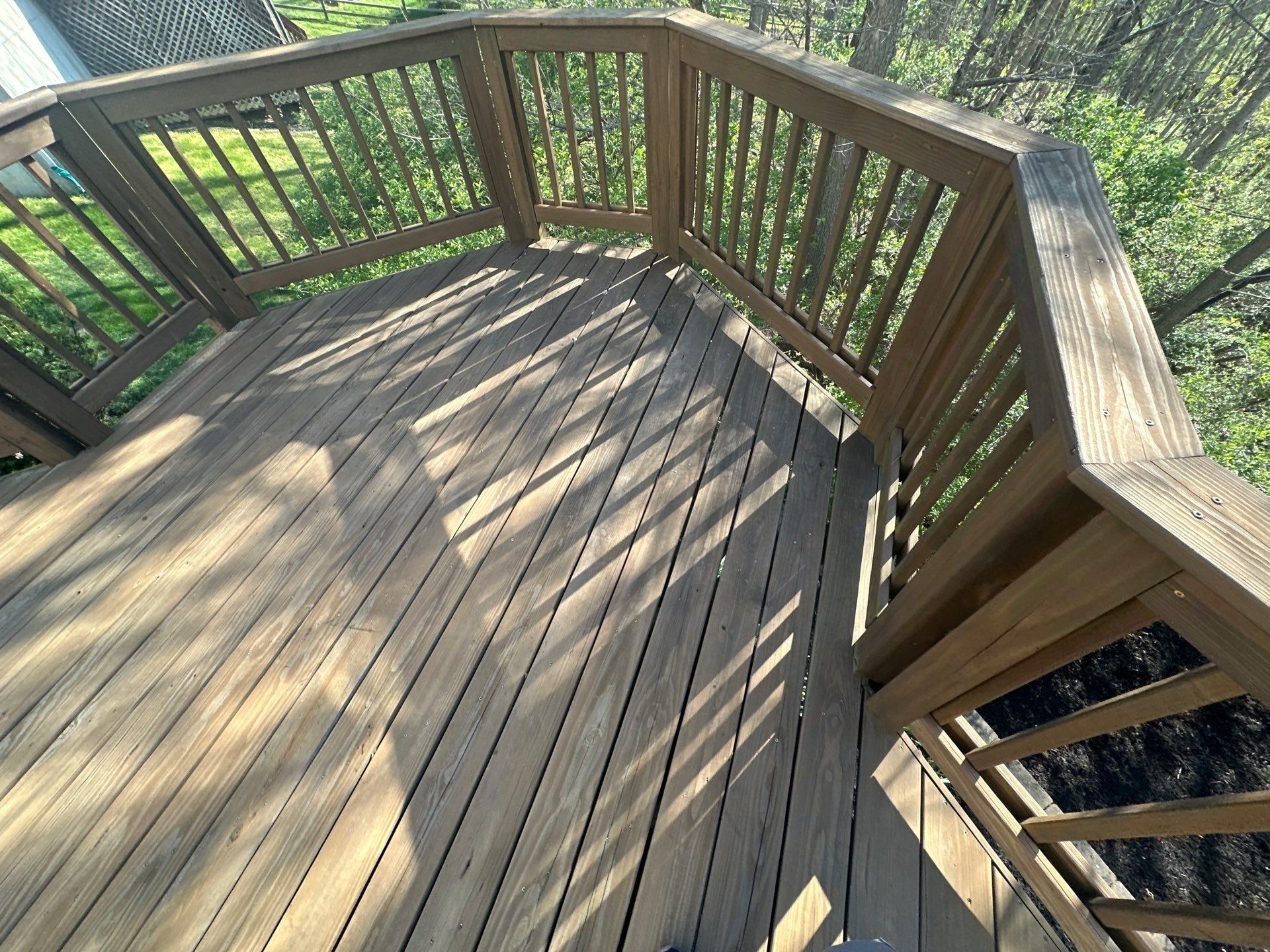 Wooden deck, rail and corner bench