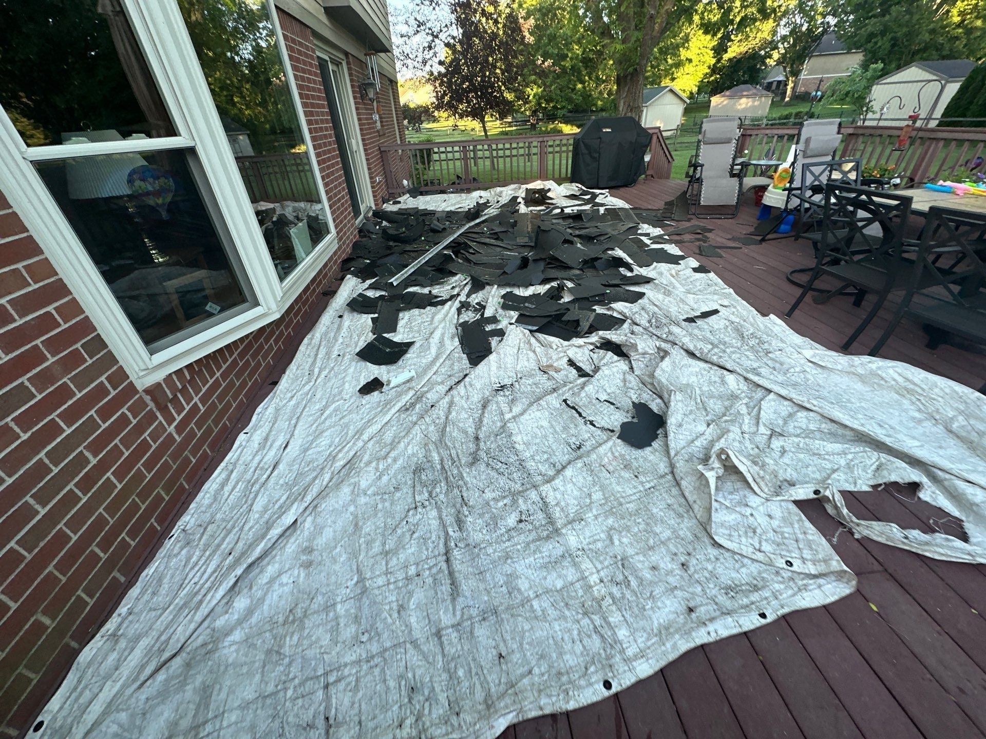 Tarp laid over the back deck to protect it during tear-off, Beavercreek, Ohio.