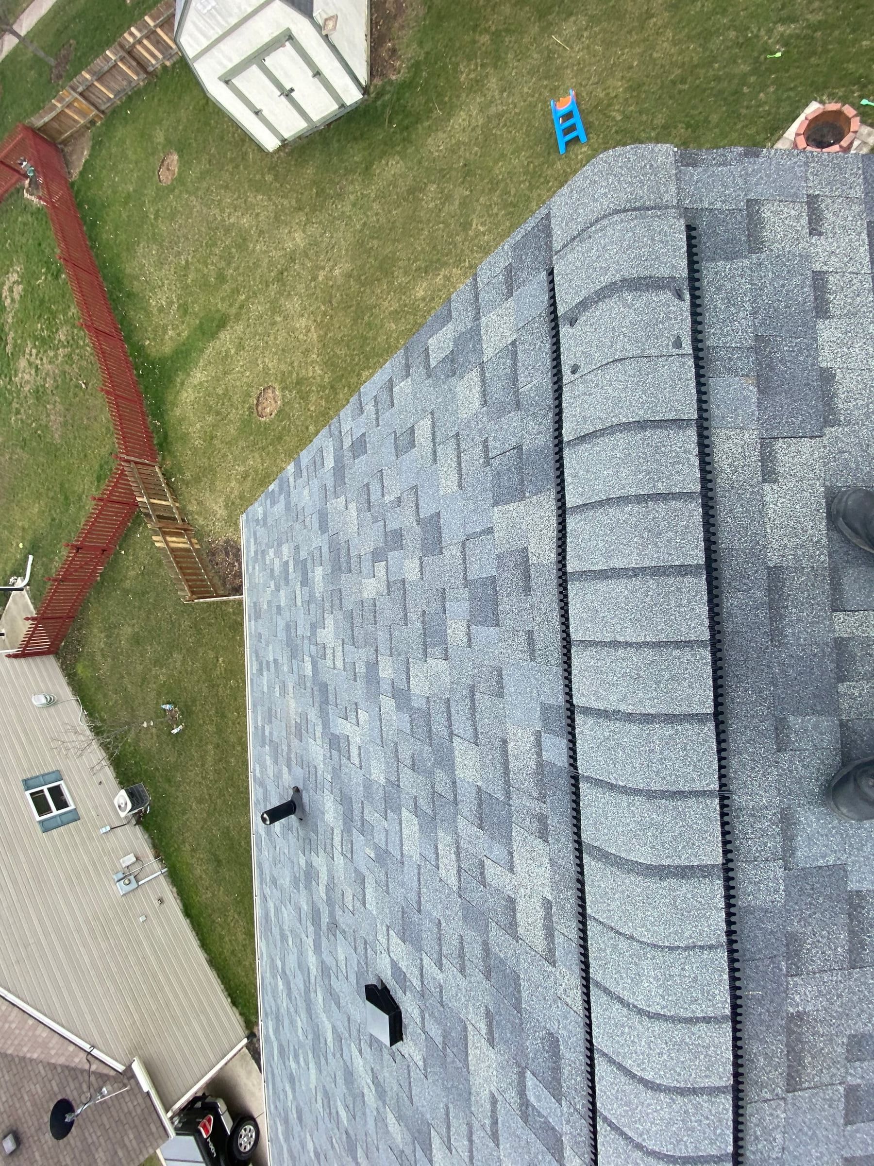 Capped hip and ridge vent close