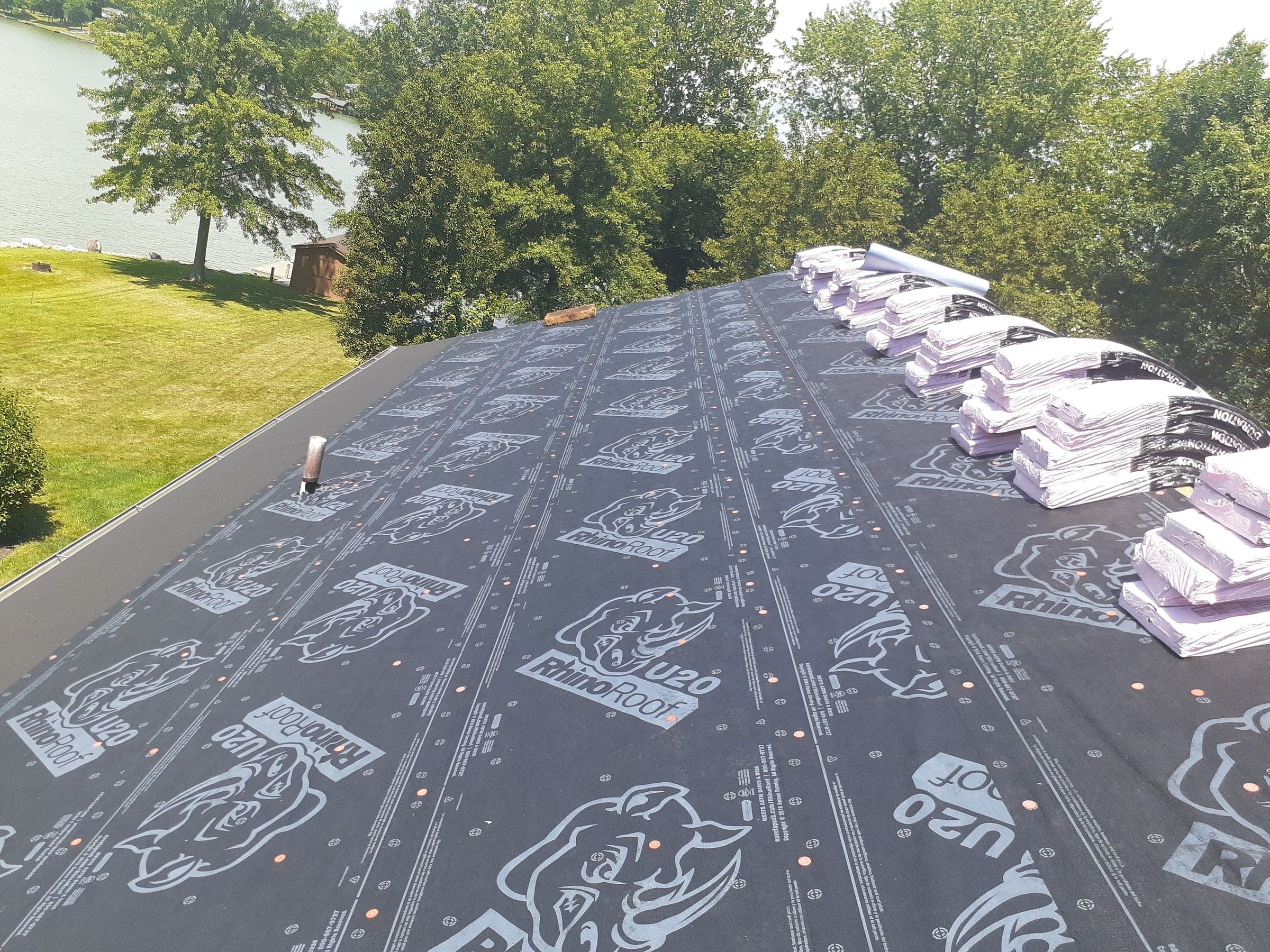 Underlayment covering the slope with shingle bundles along the ridge, Jamestown, Ohio.