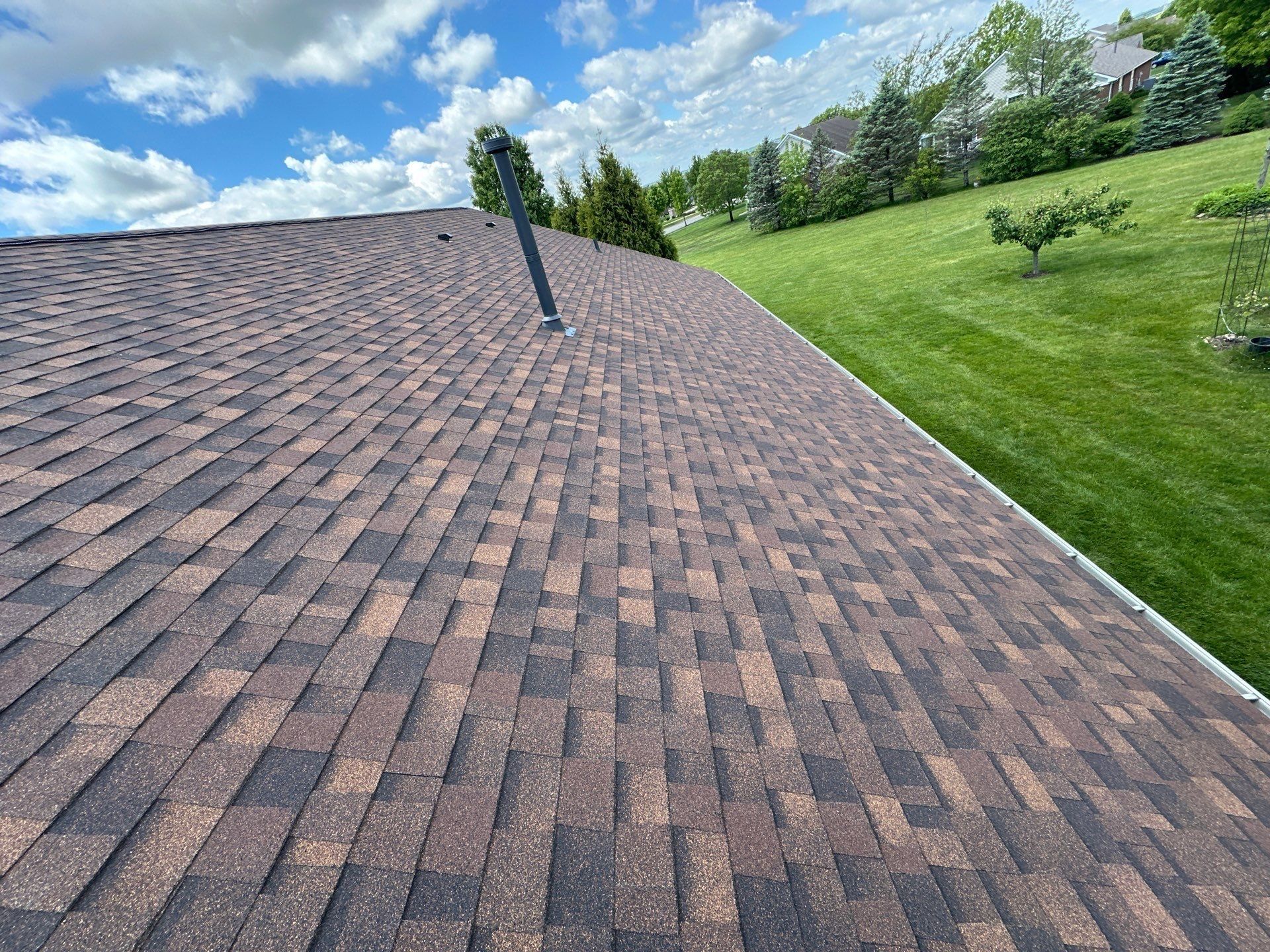 Finished back roof plane above the lawn, Beavercreek, Ohio.