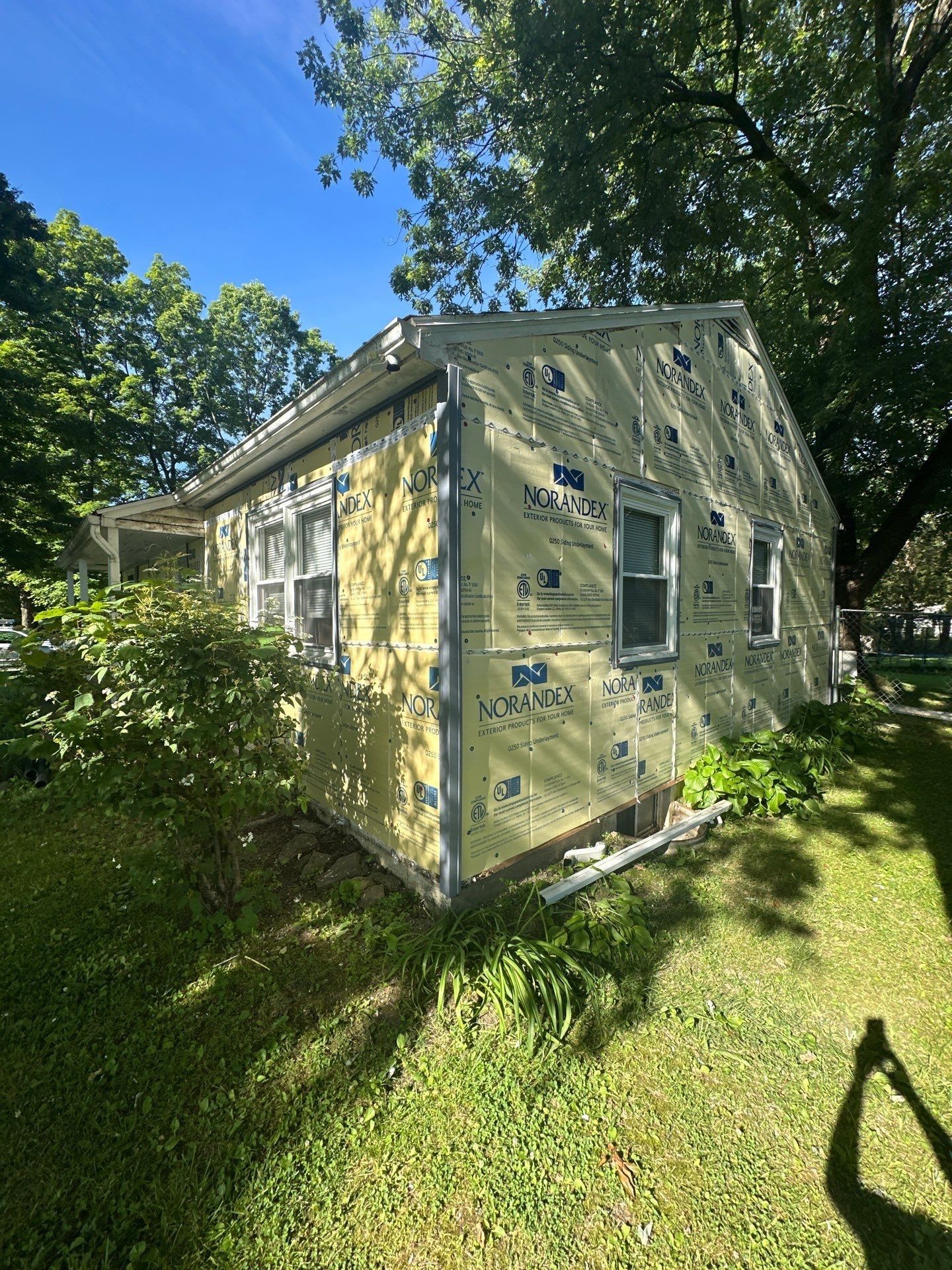 End wall board and new siding